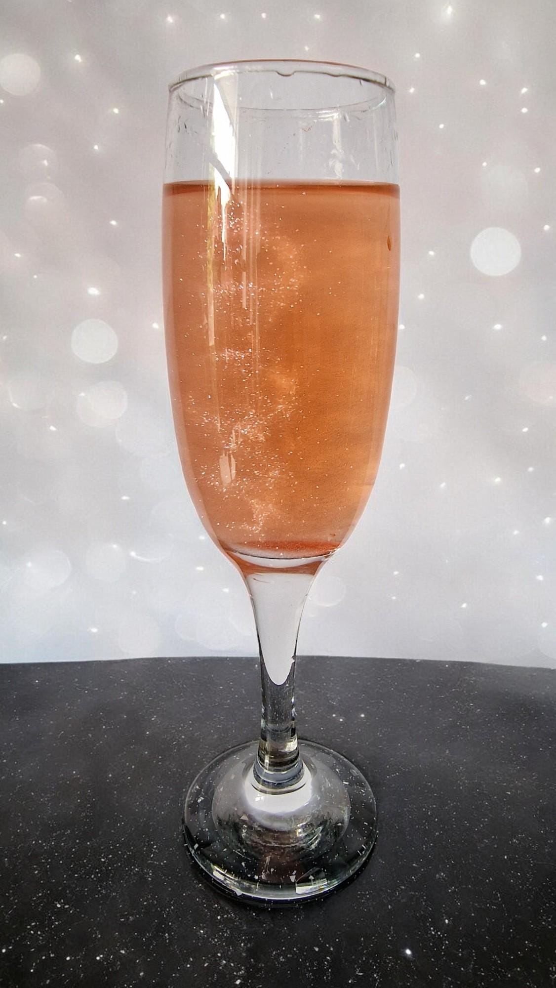 Candy floss with edible gold and silver glitter, displayed as a party drink topper for weddings and cocktail nights