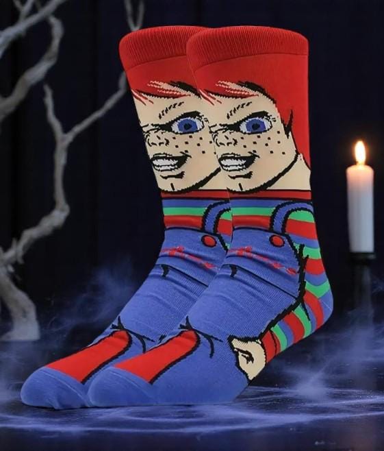 Chucky-themed socks in a Good Guys box with vegan edible cake toppers – perfect horror movie Halloween gift