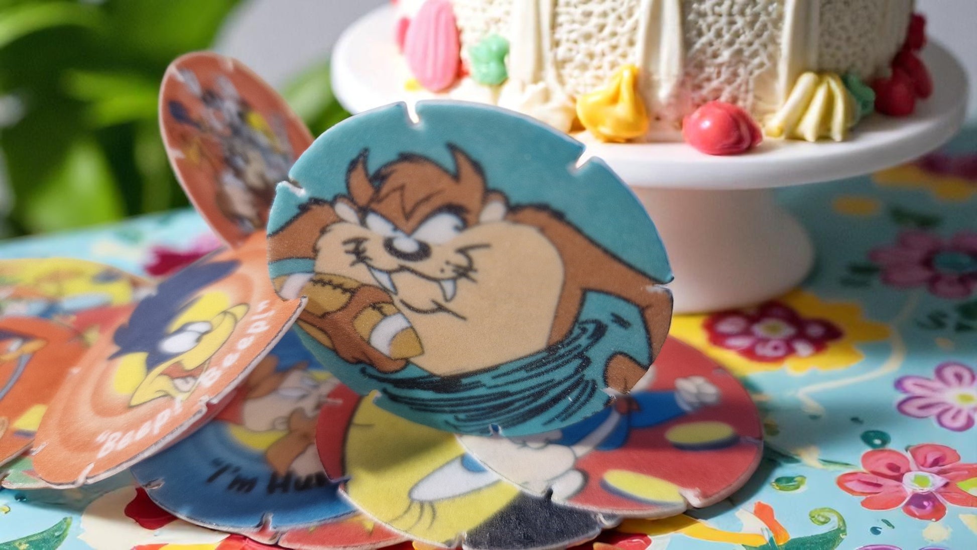 Colorful children's book with cartoon character on a floral tablecloth