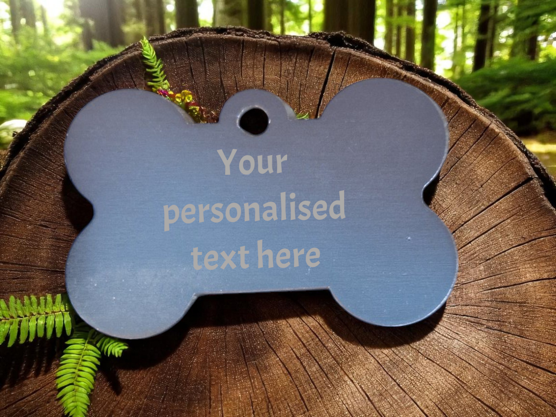 Personalised dog tag on a wooden log with a forest background