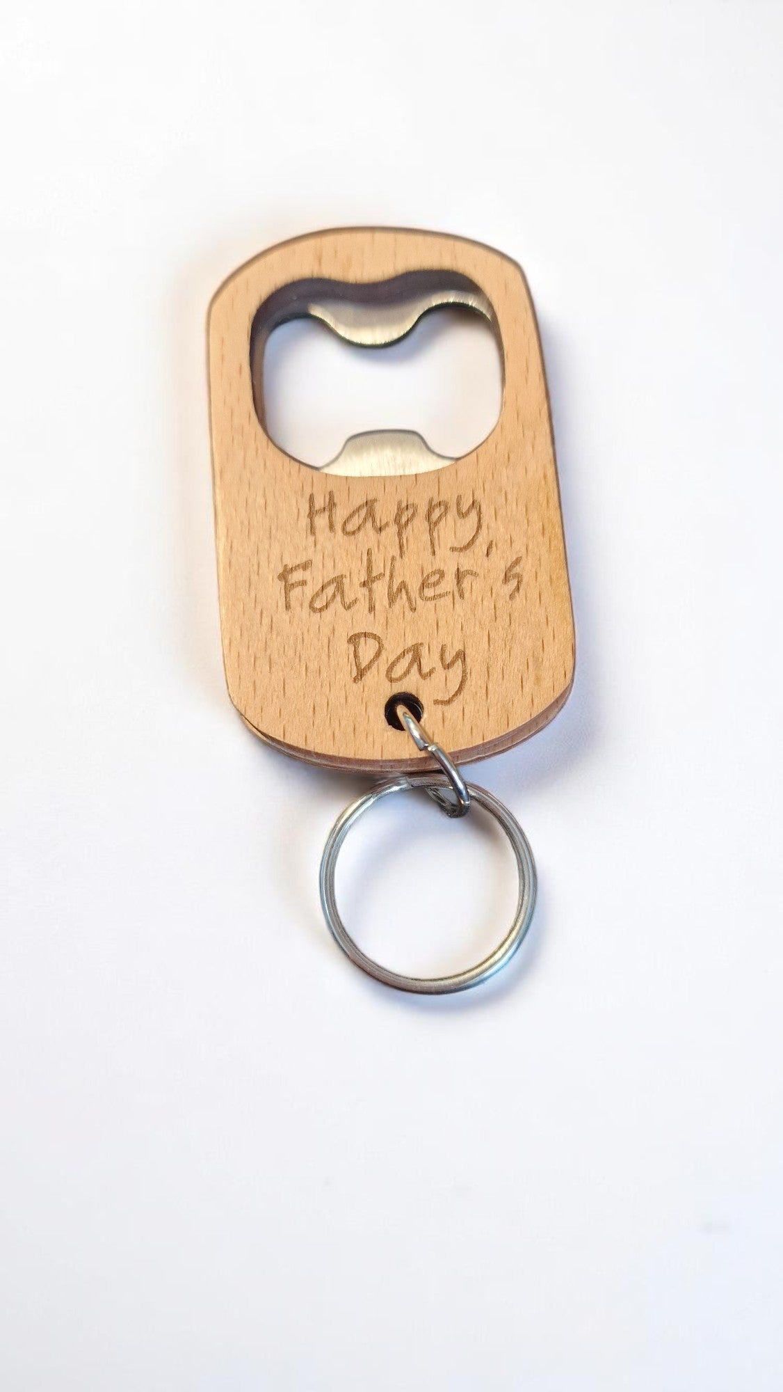Wooden bottle opener keychain with 'Happy Father's Day' engraving on a white background