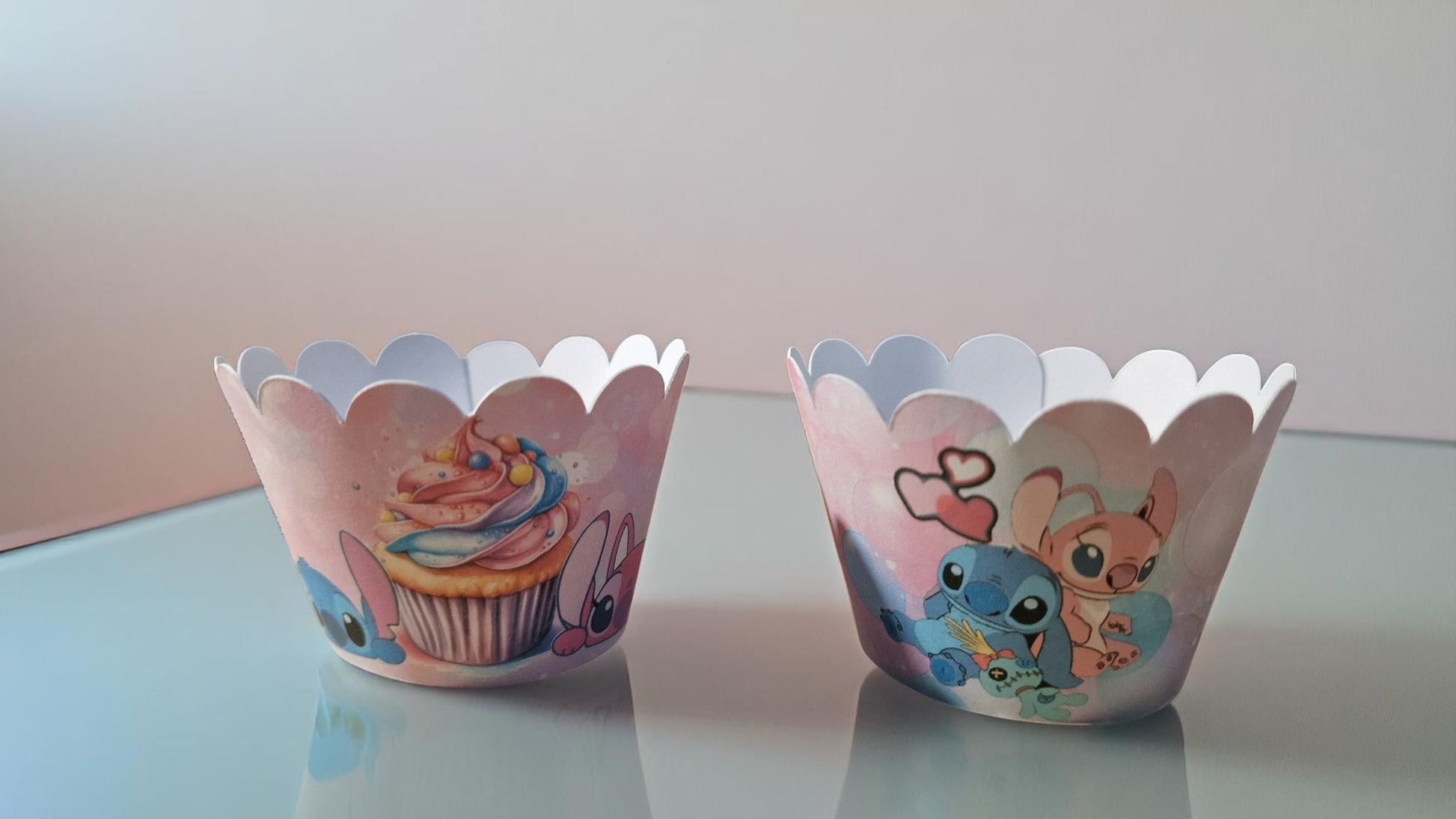 Set of 12 colourful pre-cut cupcake wrappers in two designs, made from cardstock, shown flat and assembled for birthday party decoration. Not edible