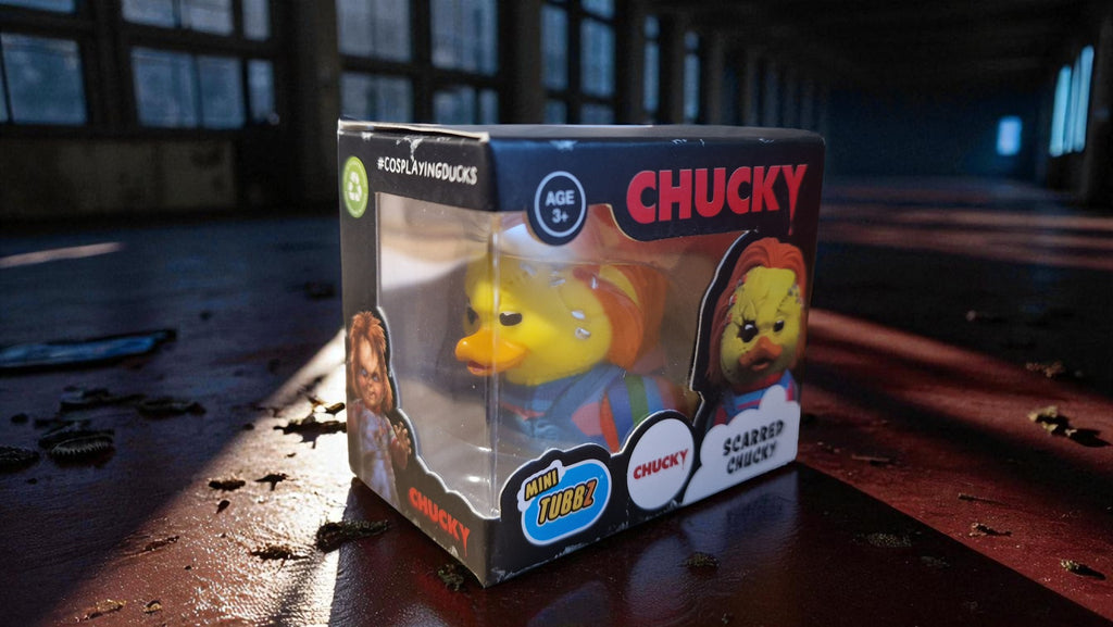 Scarred Chucky Mini TUBBZ collectible duck in display box with horror-themed background