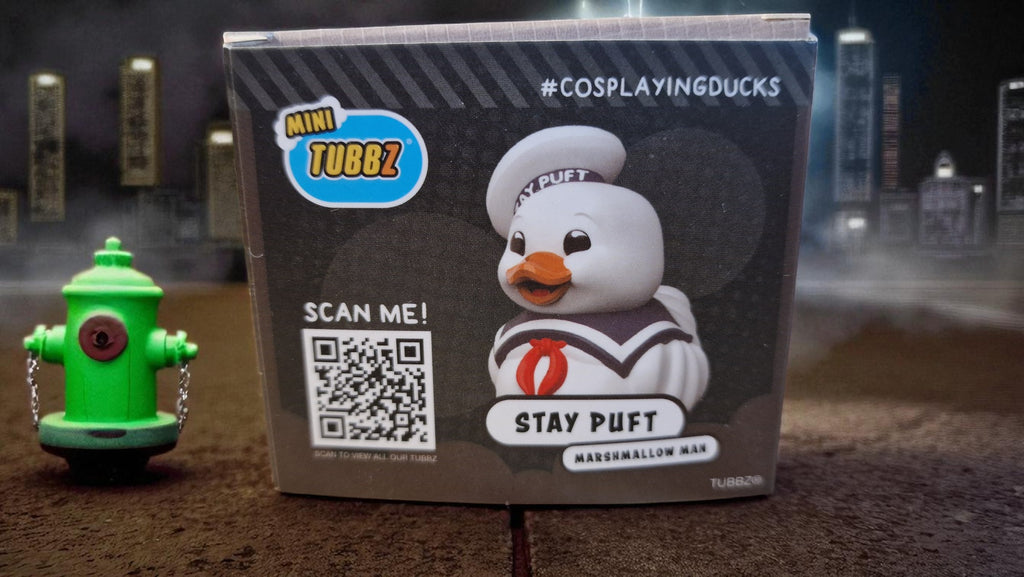 Stay Puft Marshmallow Man toy with packaging featuring a QR code and 'CosplayingDucks' branding.