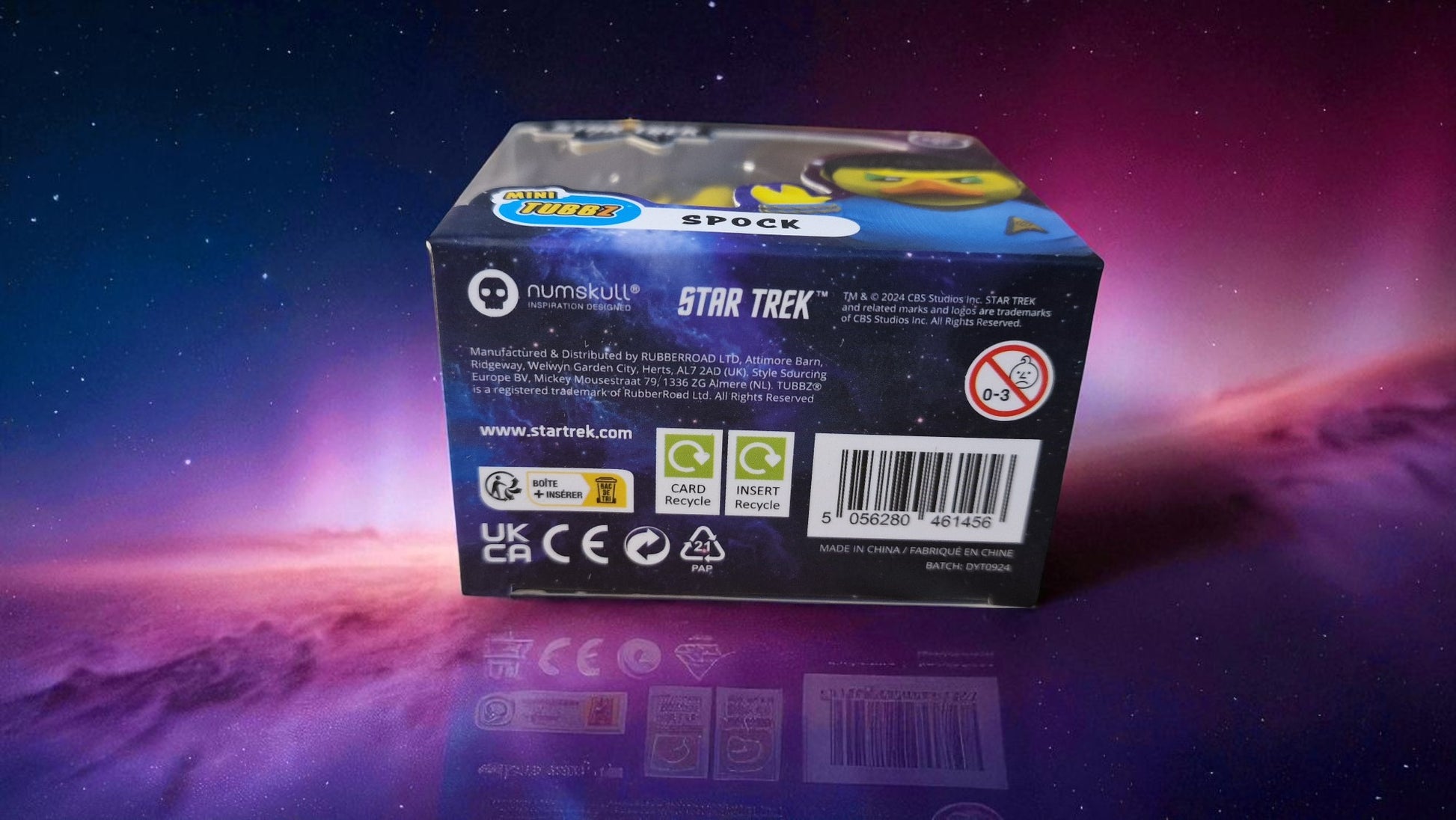 Star Trek Spock action figure box with space-themed background