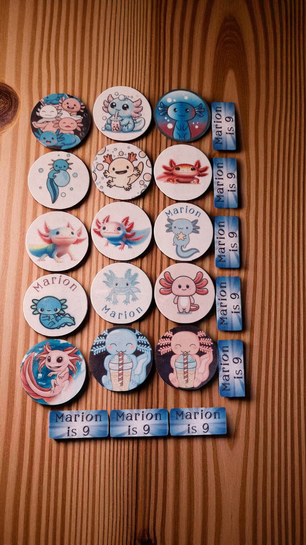 Collection of cartoon character magnets on a wooden surface