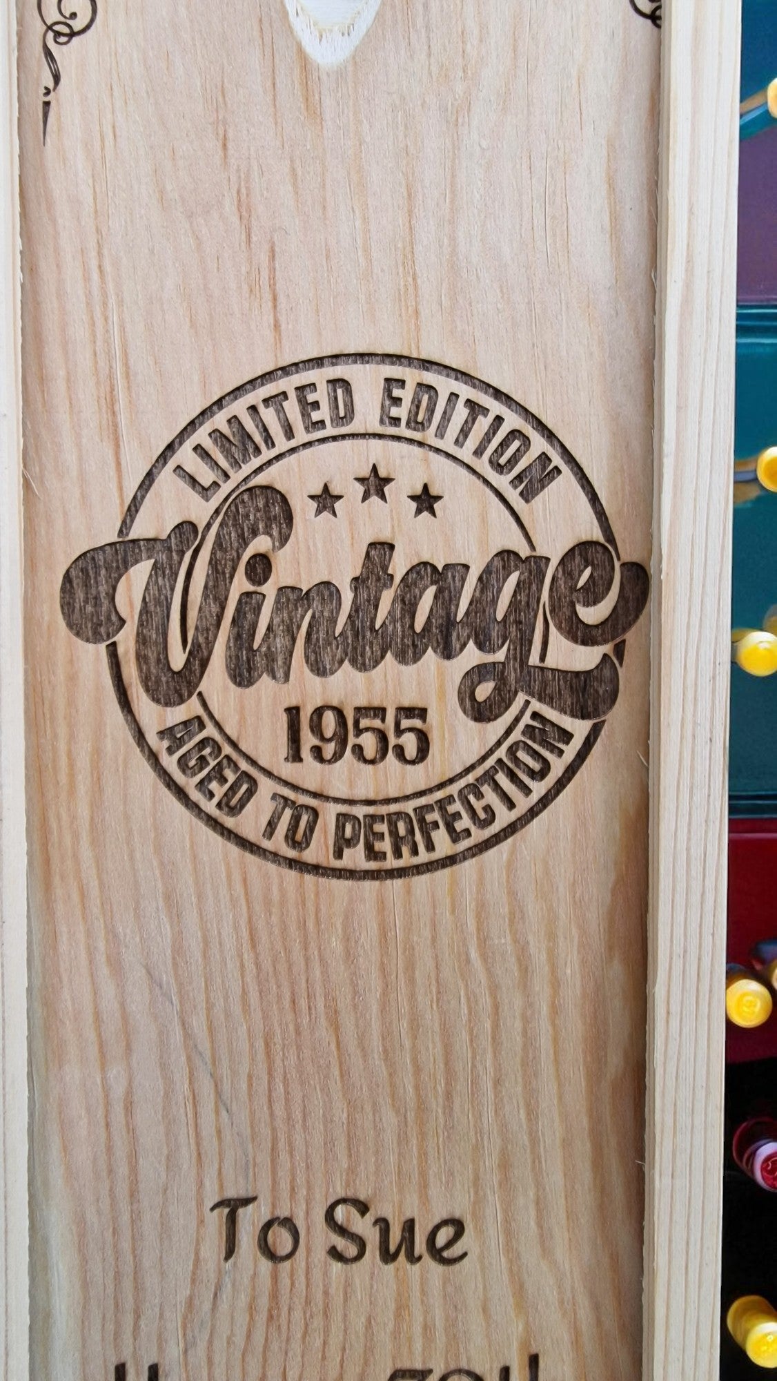Wooden wine box with 'Vintage 1955' engraving and personalized message.