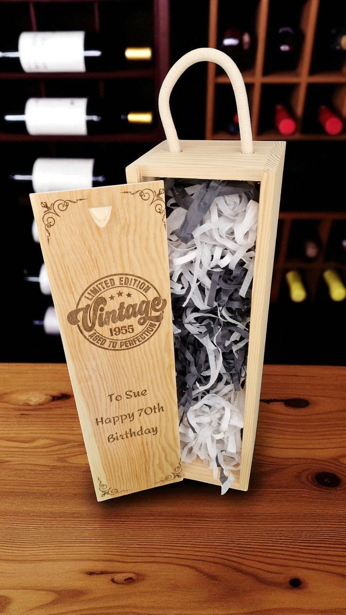 Wooden wine box with 'Vintage 1995' design on a wooden surface.