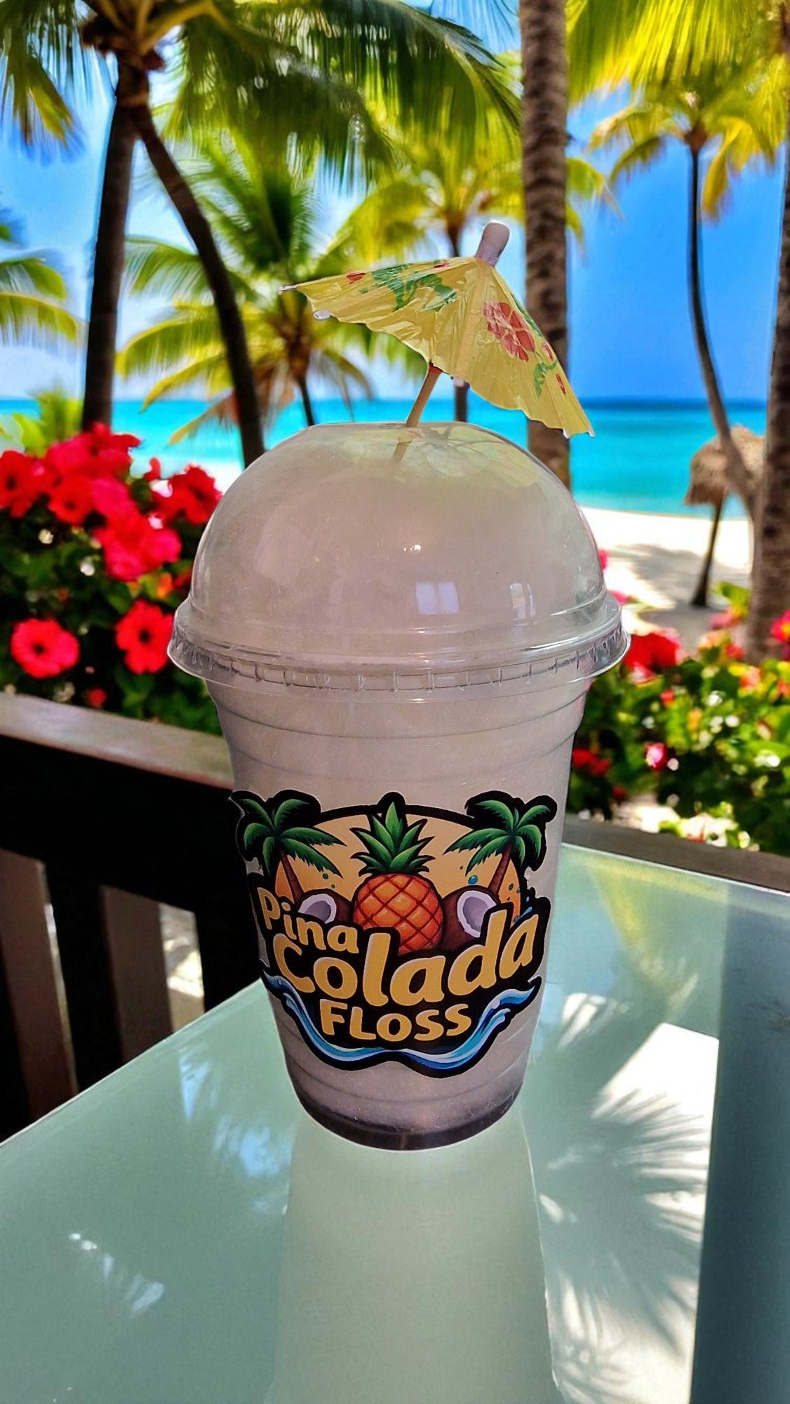 Tropical-themed drink with a pineapple logo on a beach setting