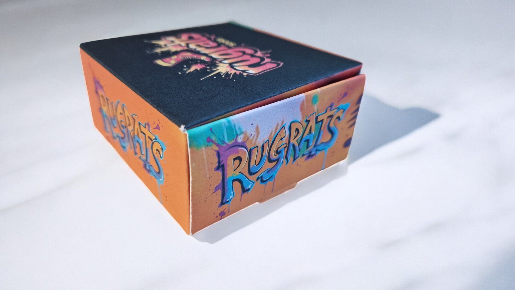 Box with 'Rugrats' branding on a white background