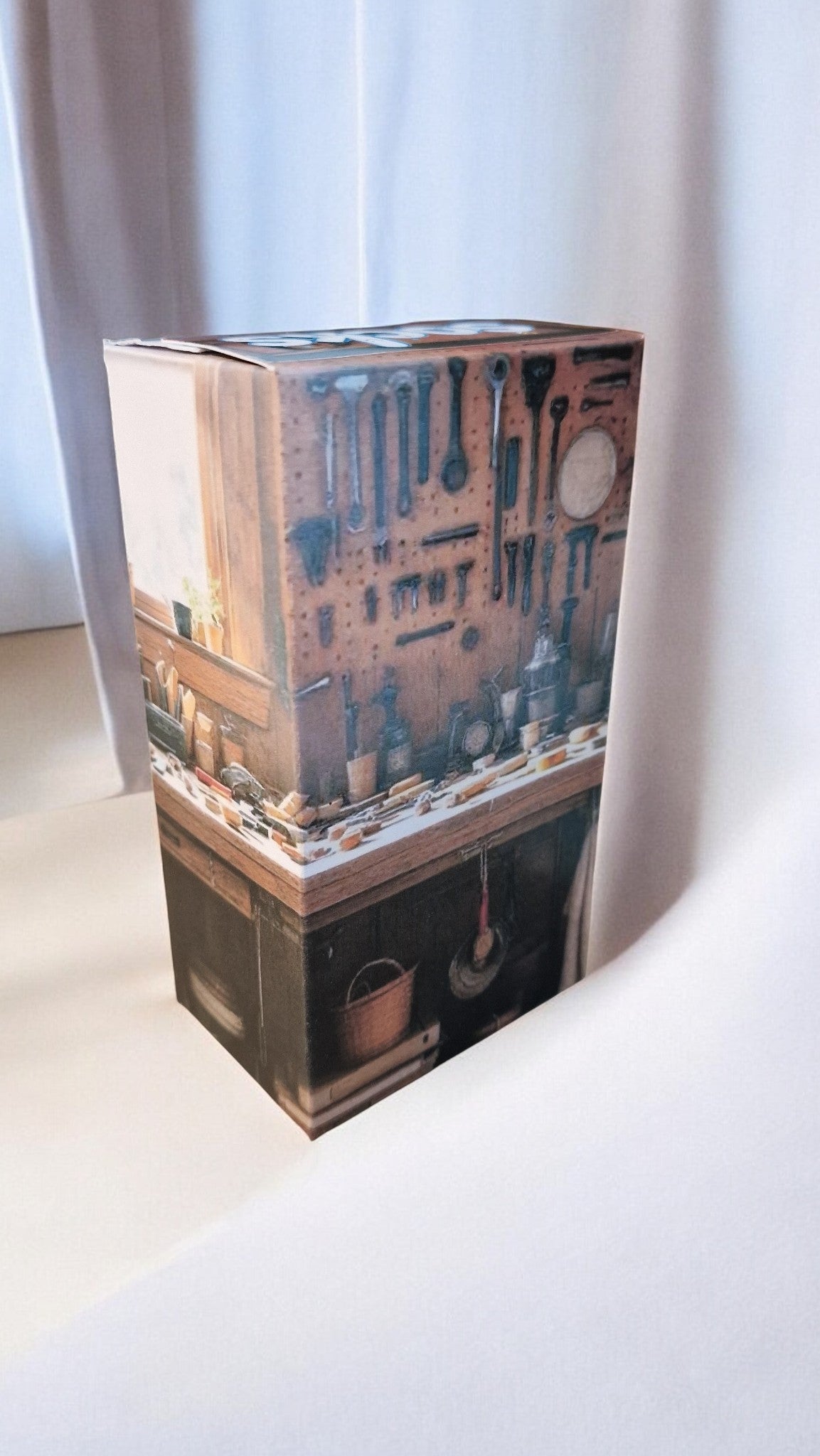 Decorative box with kitchen utensil design on a white background
