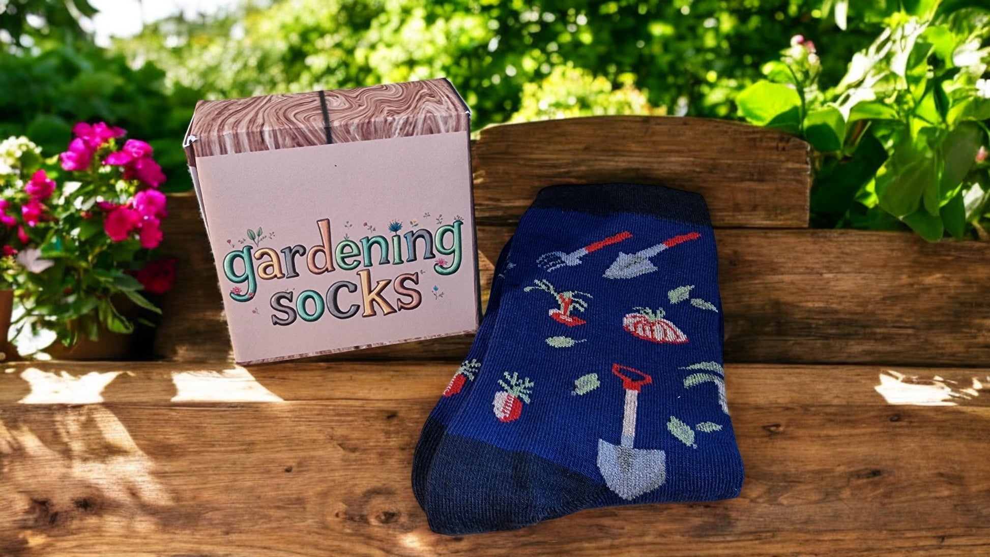 Blue gardening-themed sock with a box labeled 'gardening socks' on a wooden bench outdoors.