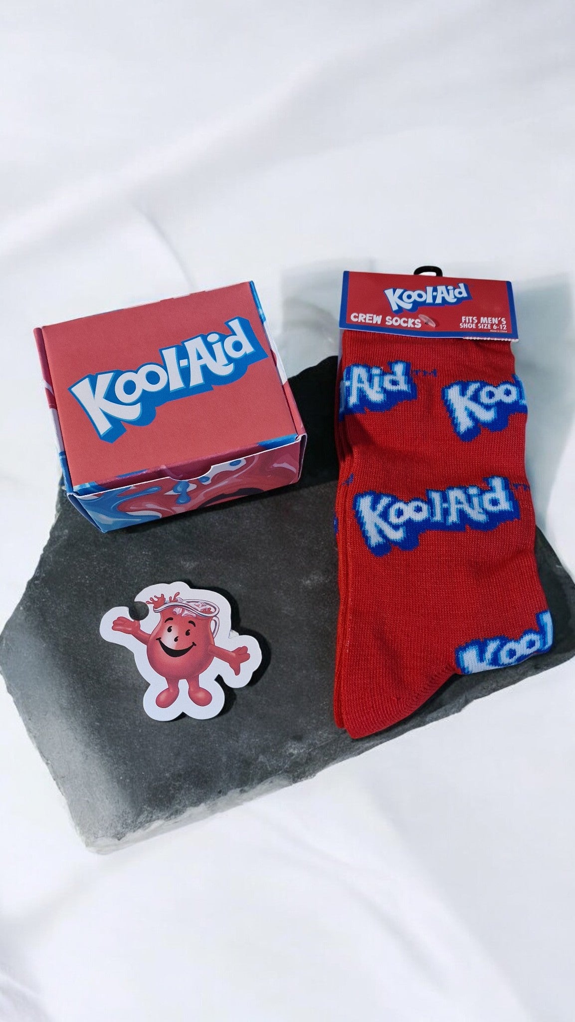 Kool-Aid branded socks and packaging on a white background