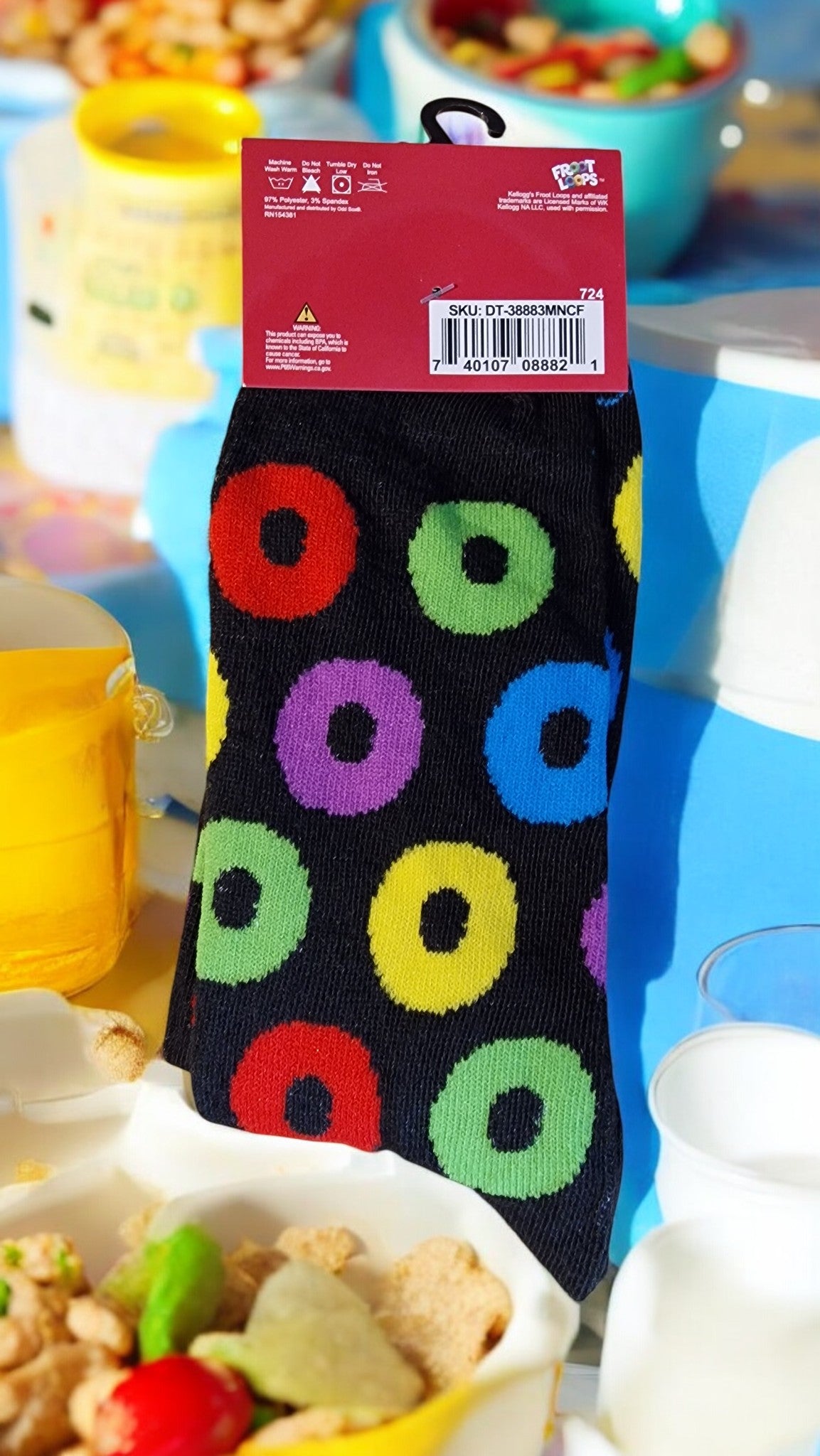 Colorful polka dot sock with a brand label on a blurred background