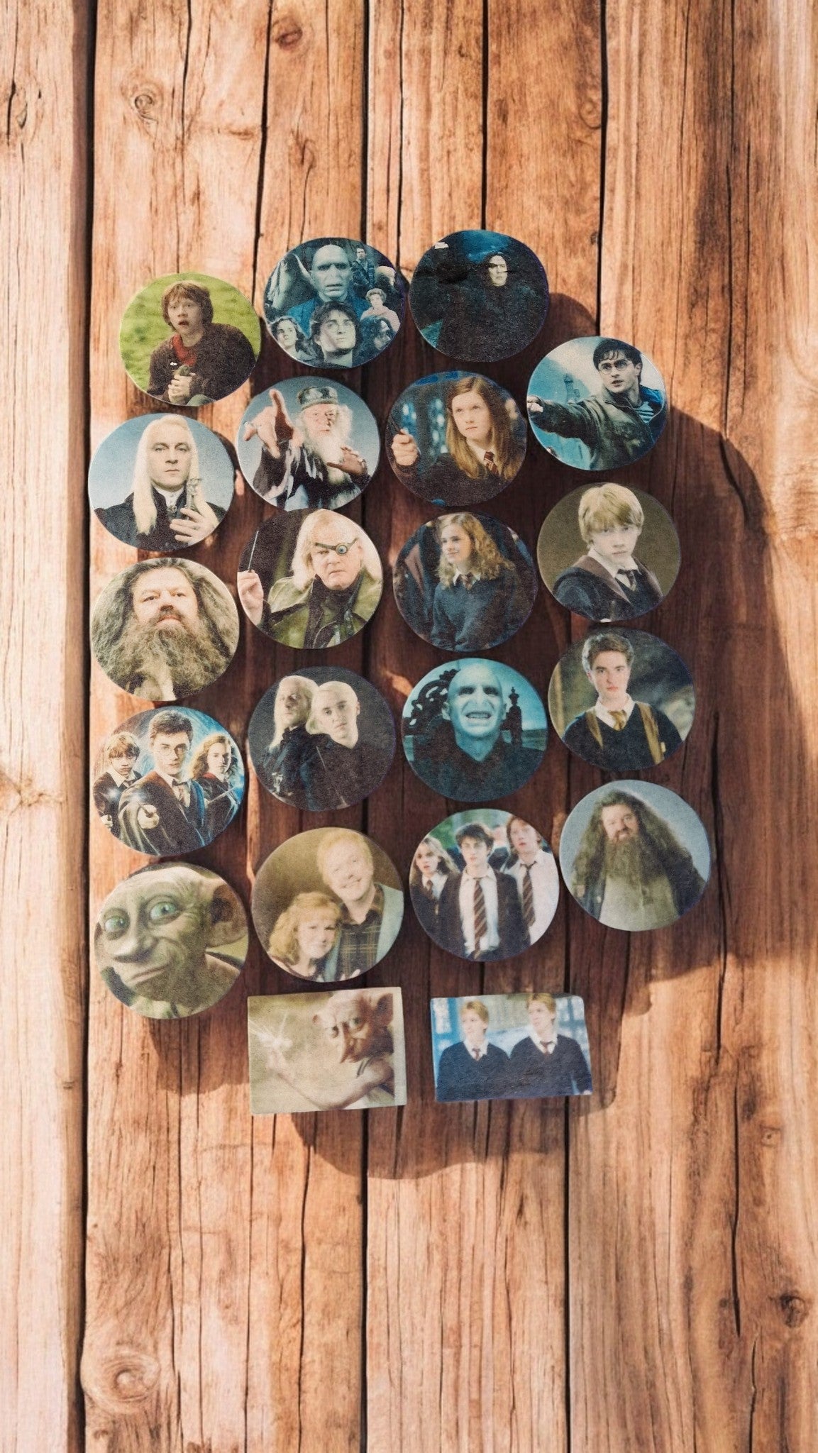 Collection of circular character portraits on a wooden surface