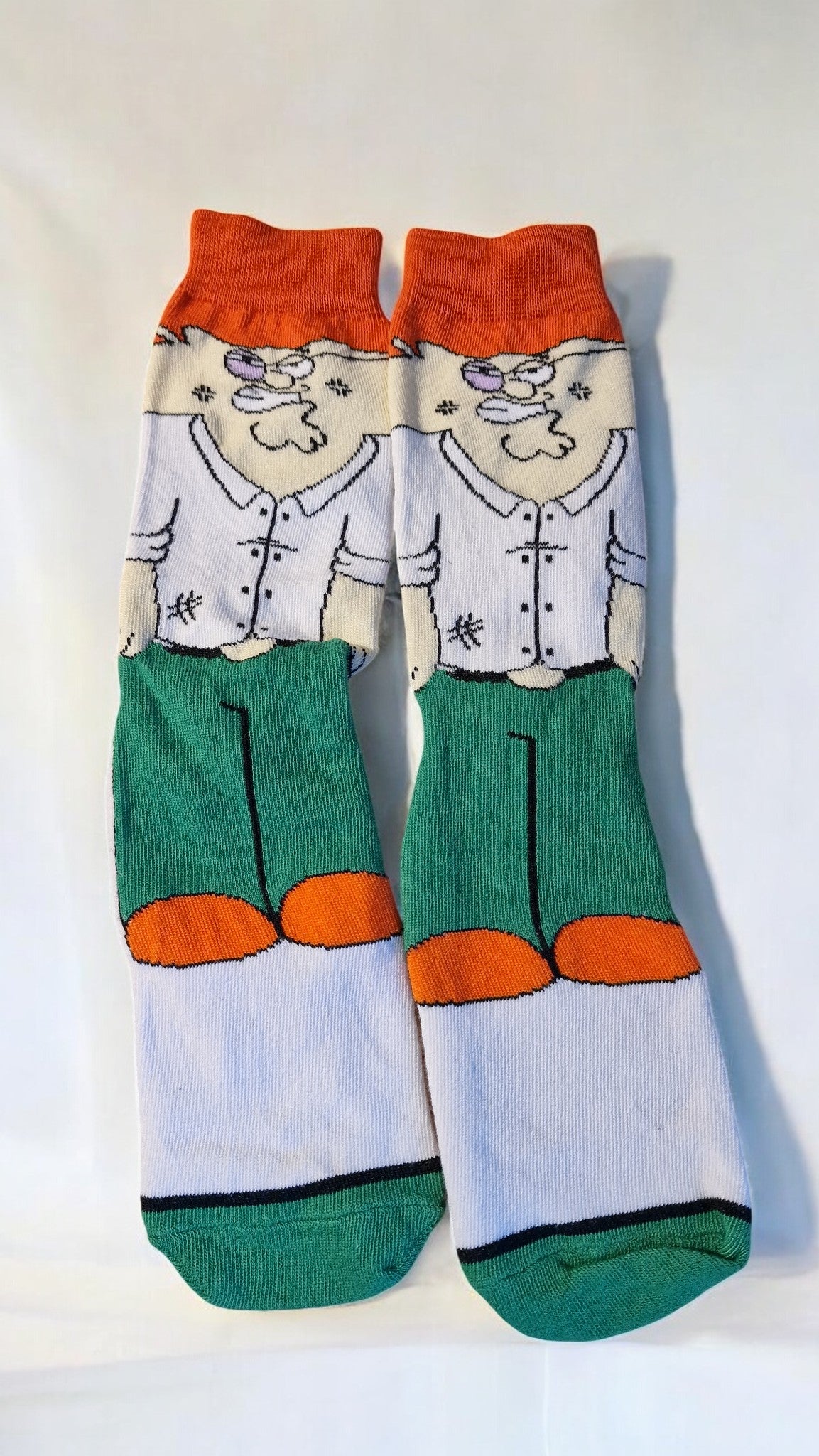 Pair of socks with cartoon character design on a white background
