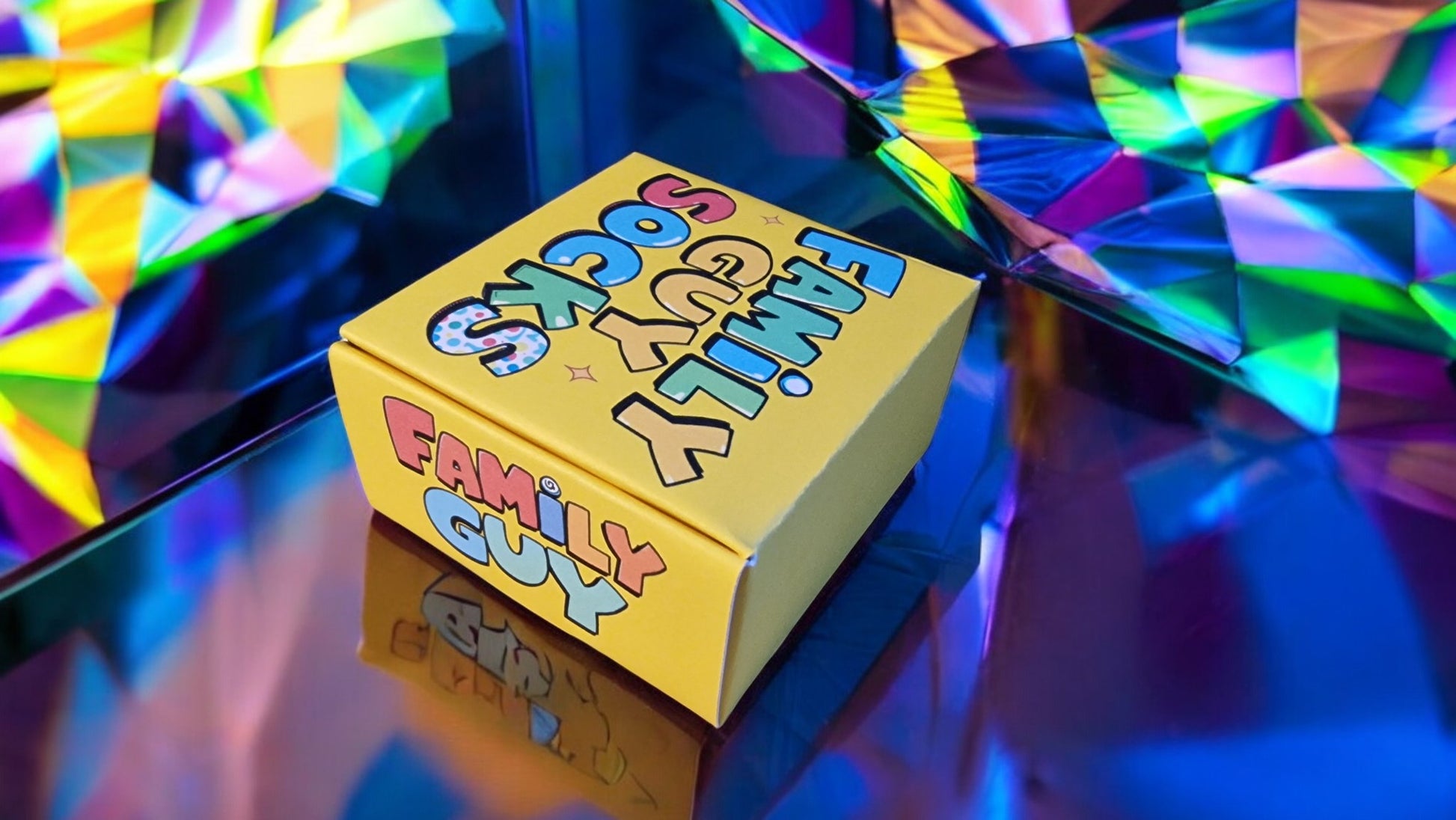 Yellow 'Family Guy' box with colorful geometric background