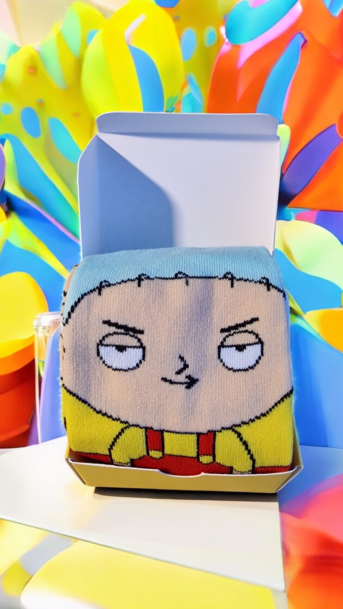 Sock with cartoon character design on a colorful background