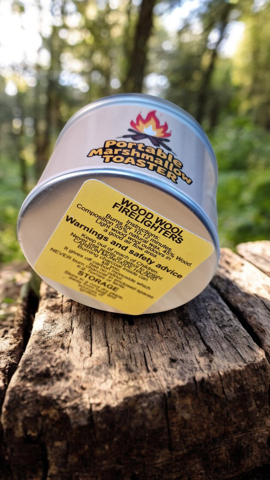Portable marshmallow roaster on a log with a forest background