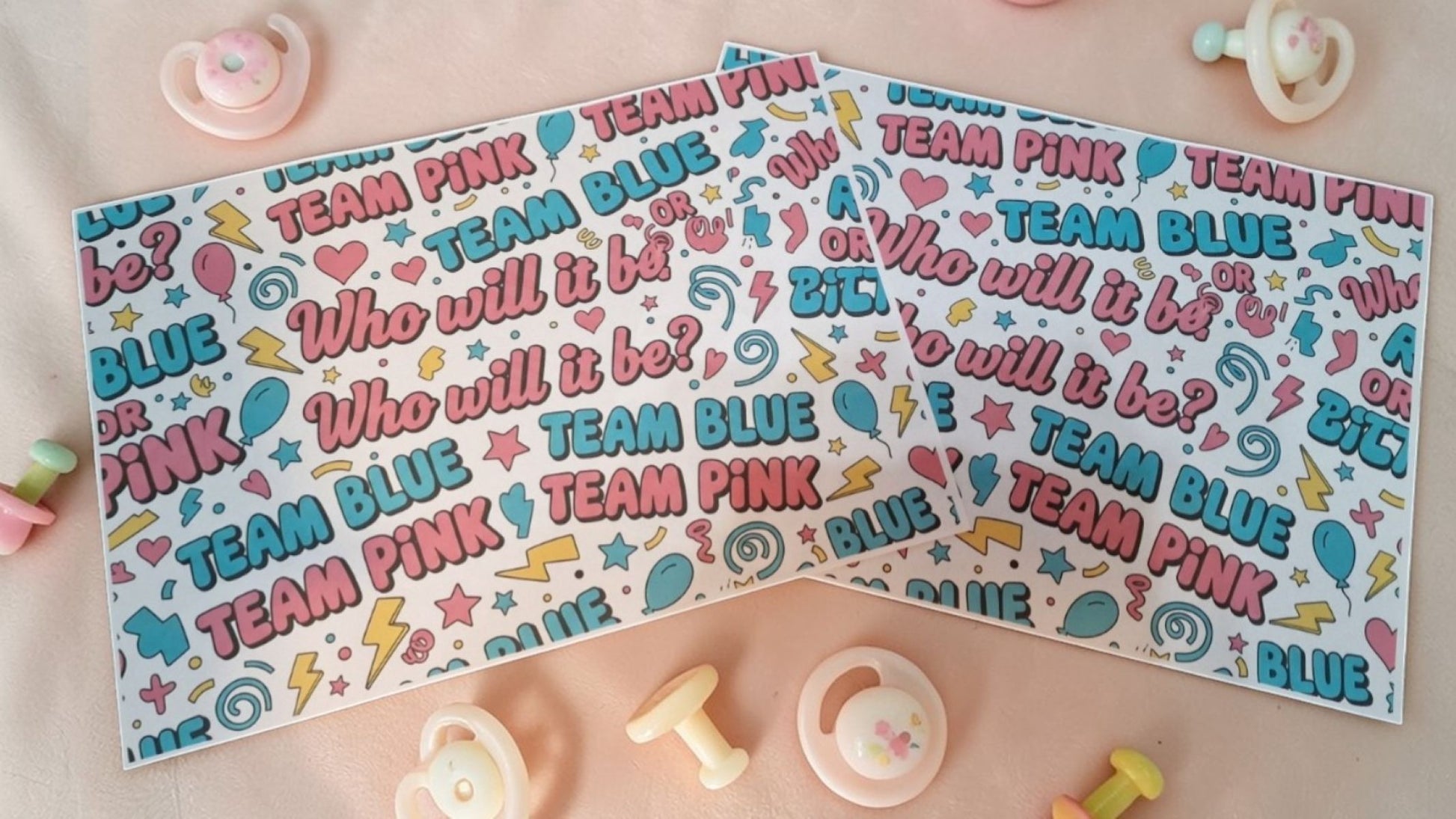 Two baby shower gender reveal cards with 'Team Pink' and 'Team Blue' text on a pink background.