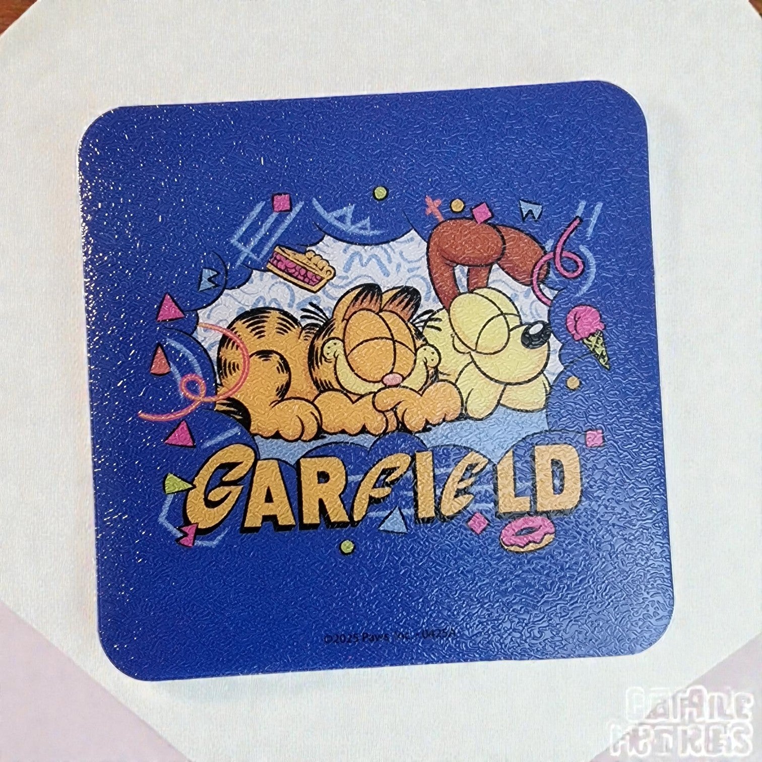 Mouse pad with Garfield and Odie design on a blue background