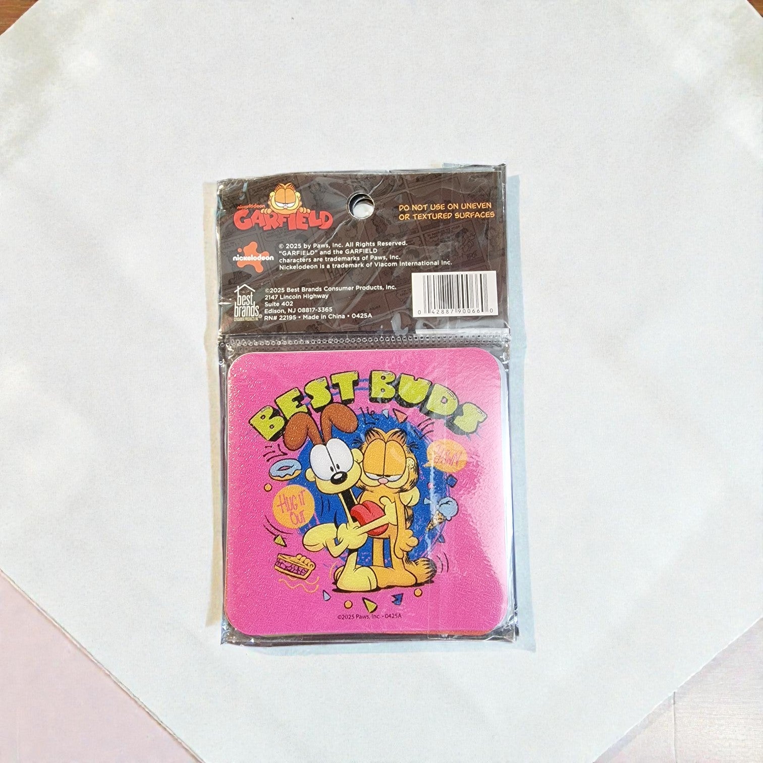 Packaged pink item with Garfield cartoon character on a white background