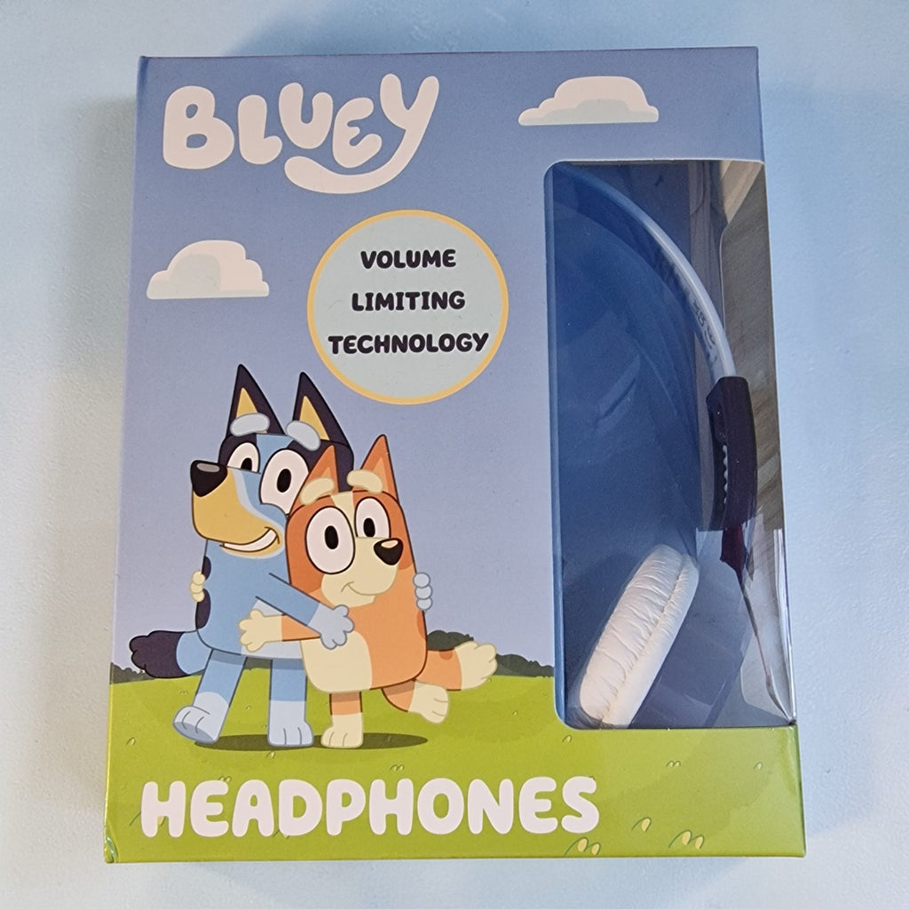 Bluey-themed headphones in a box with cartoon characters on a light blue background