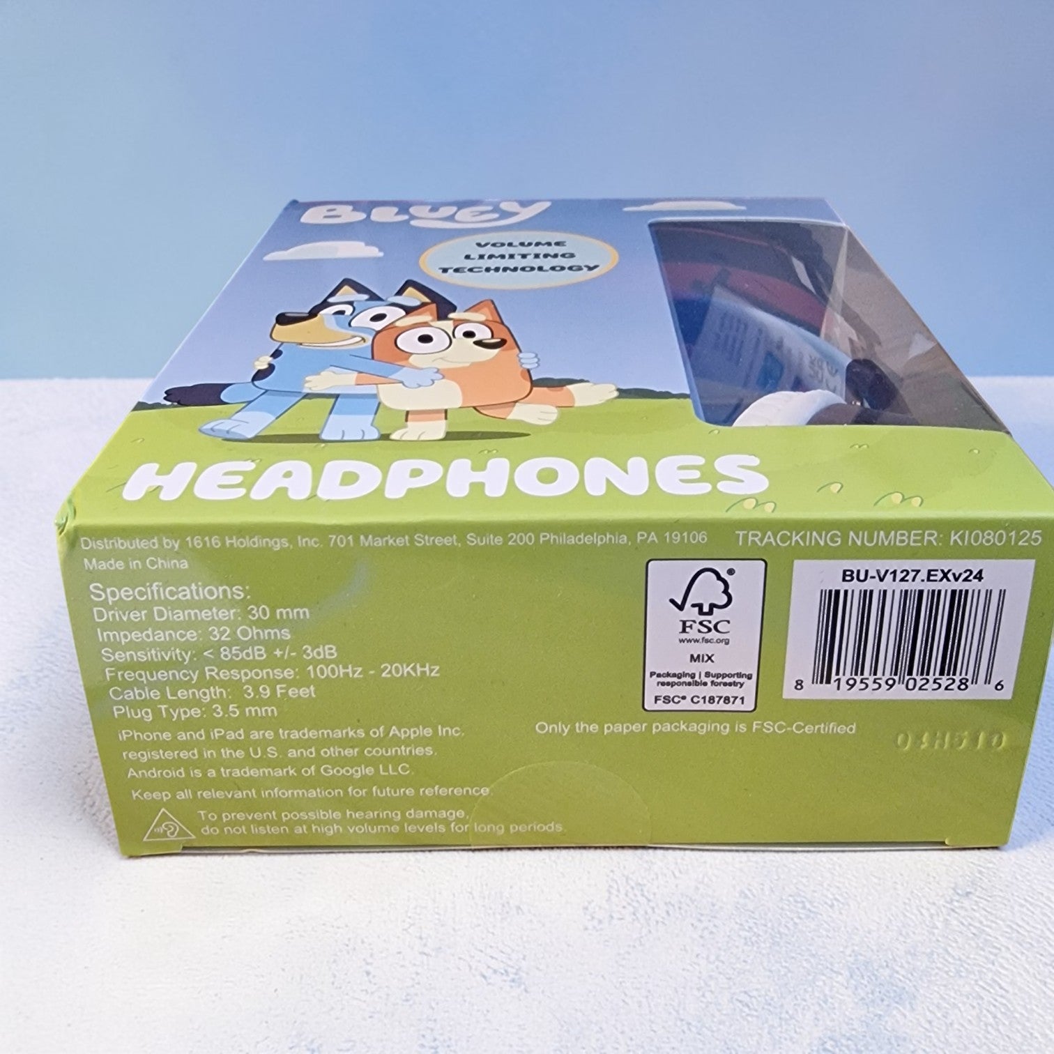 Box of Bluey headphones with cartoon characters on a light blue background