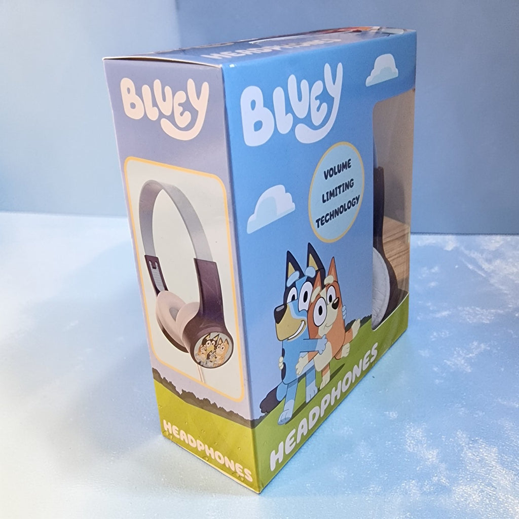 Box of Bluey headphones with cartoon characters on a light blue background
