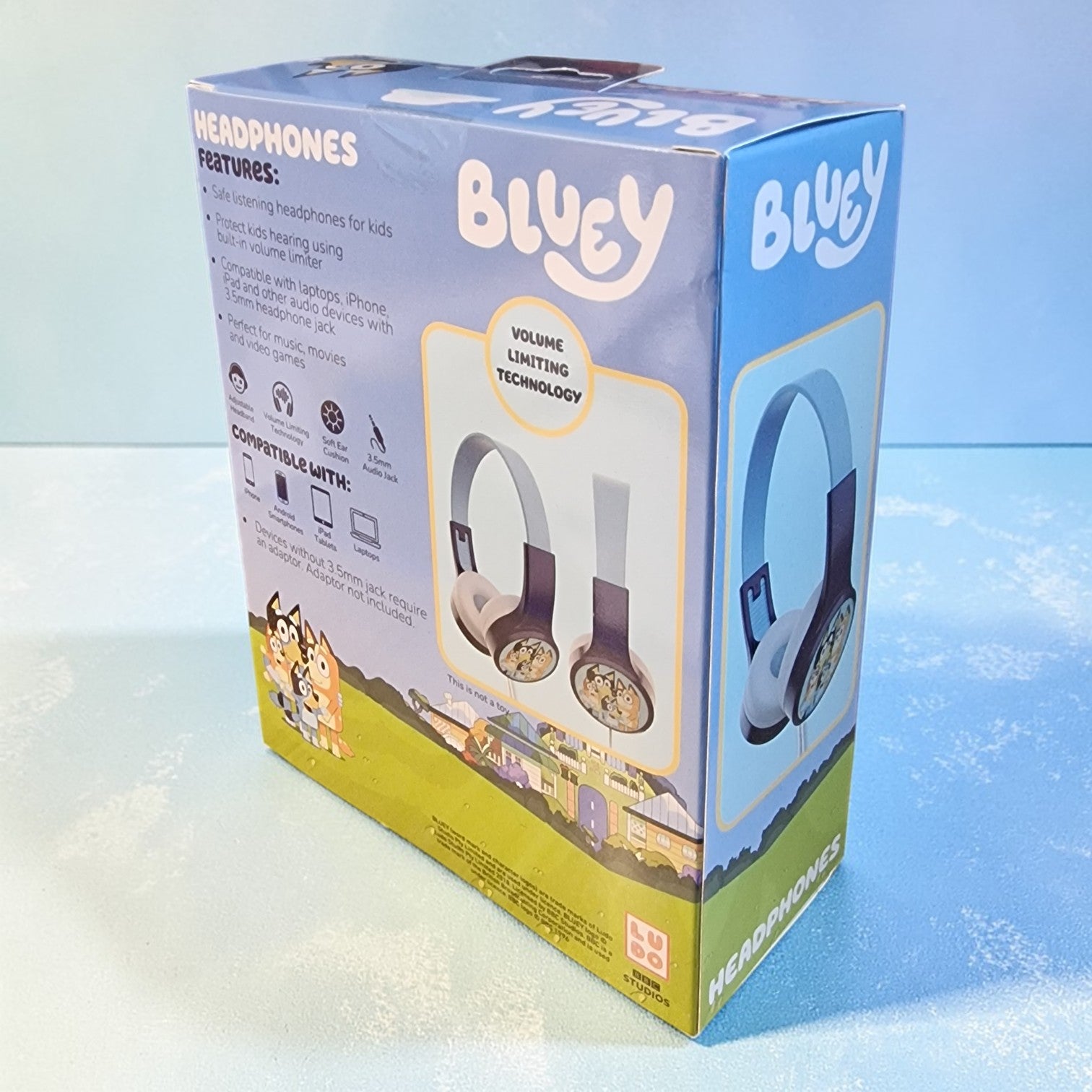 Box of Bluey headphones with a blue background