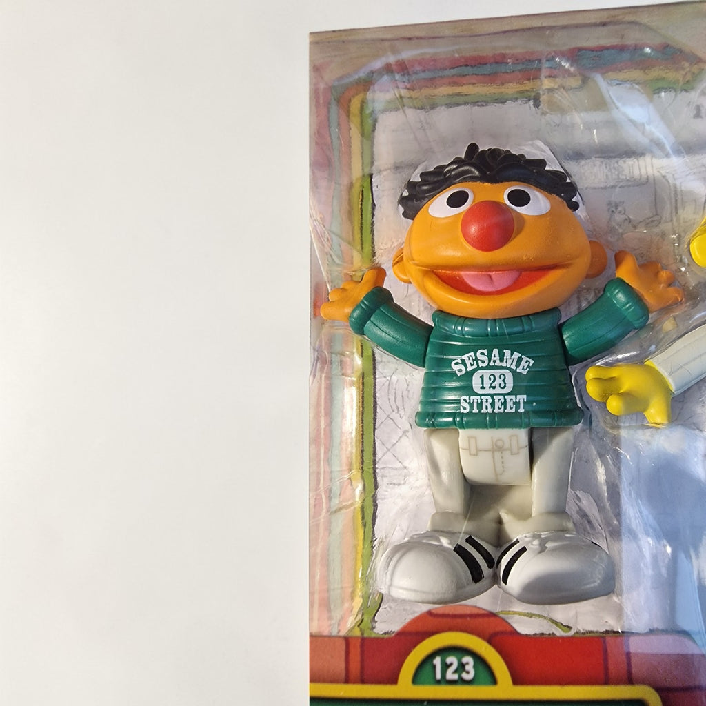Sesame Street figurine in packaging on a white background