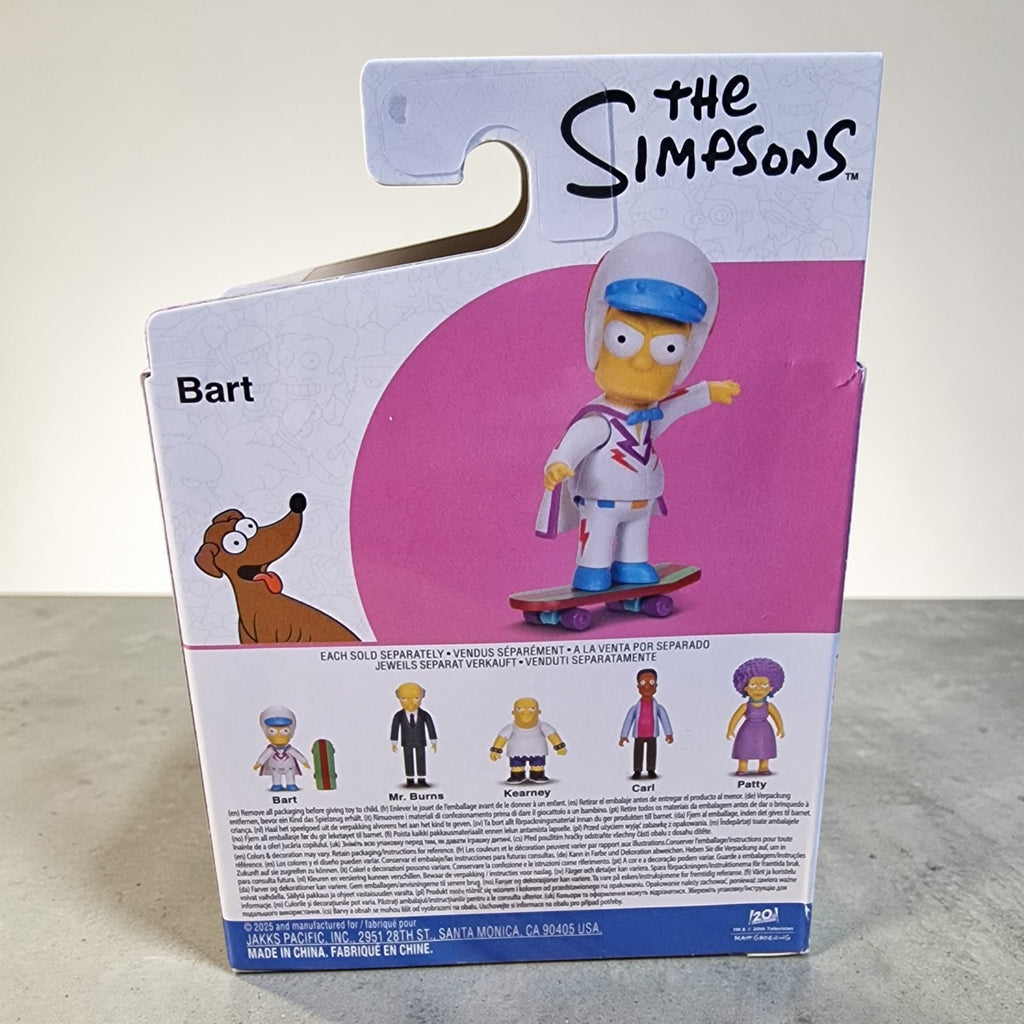 Package of a 'The Simpsons' Bart Simpson action figure with a pink circle on a gray surface.