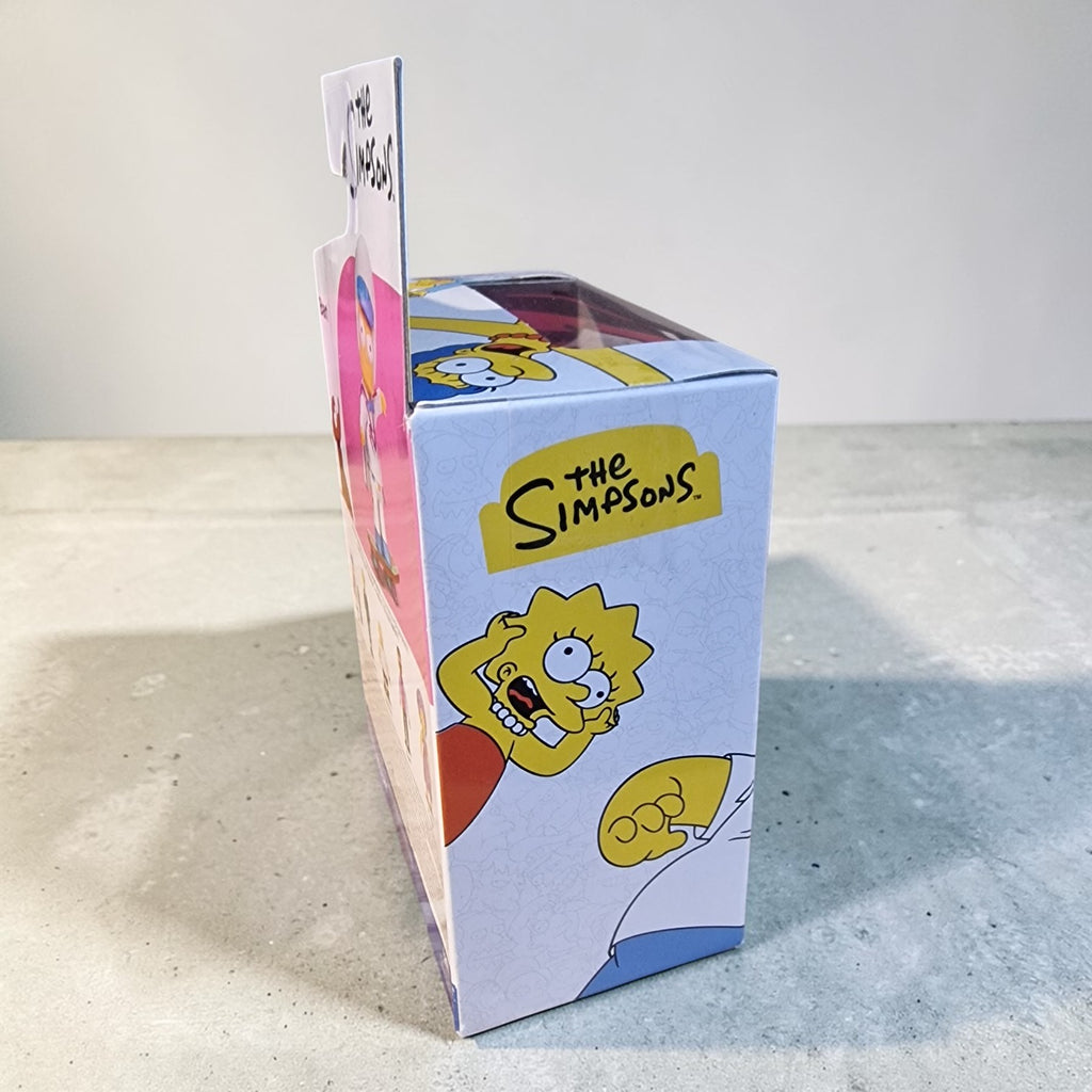 Cartoon character-themed box on a light surface
