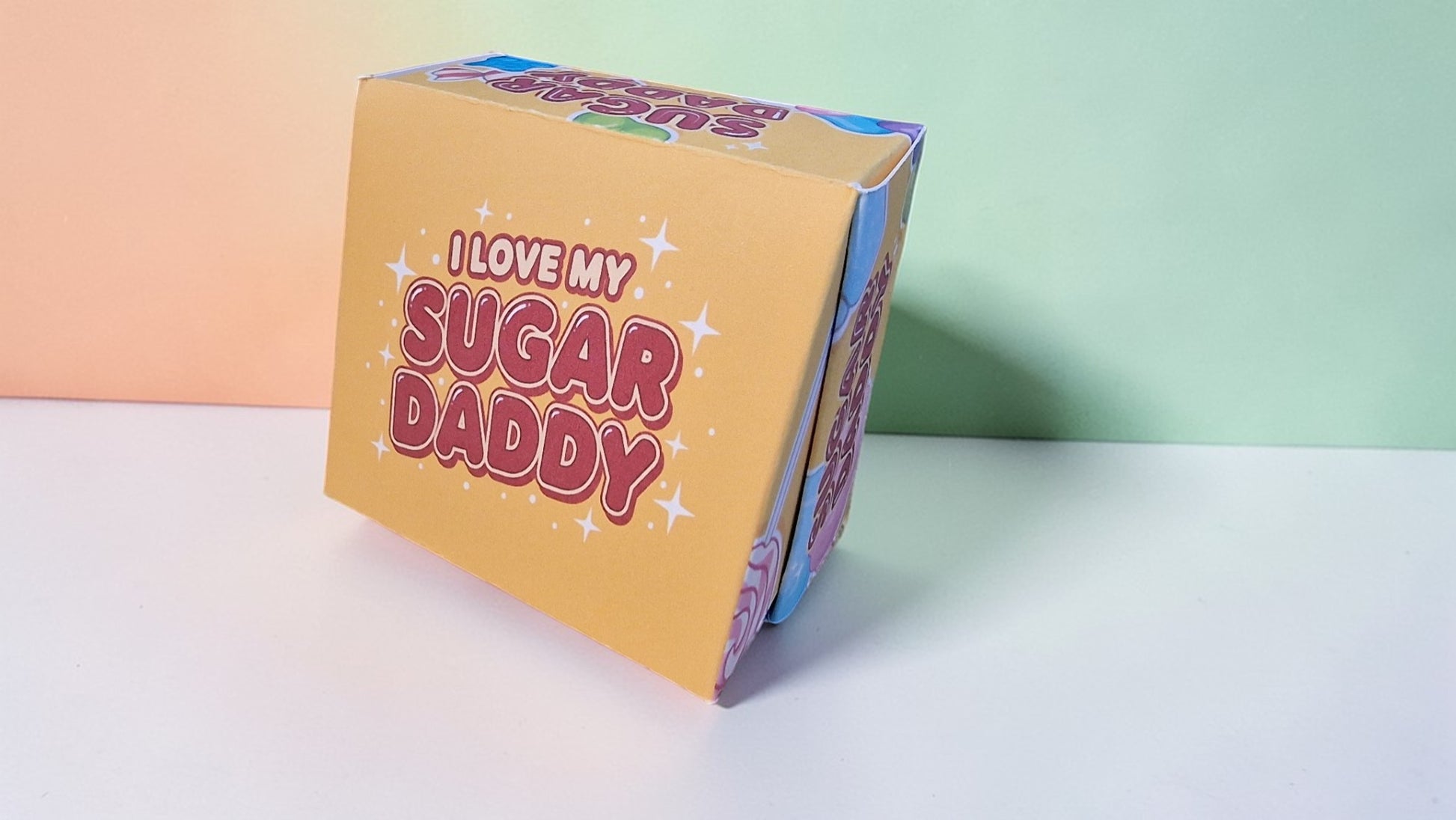 Box with 'I Love My Sugar Daddy' text on a gradient background