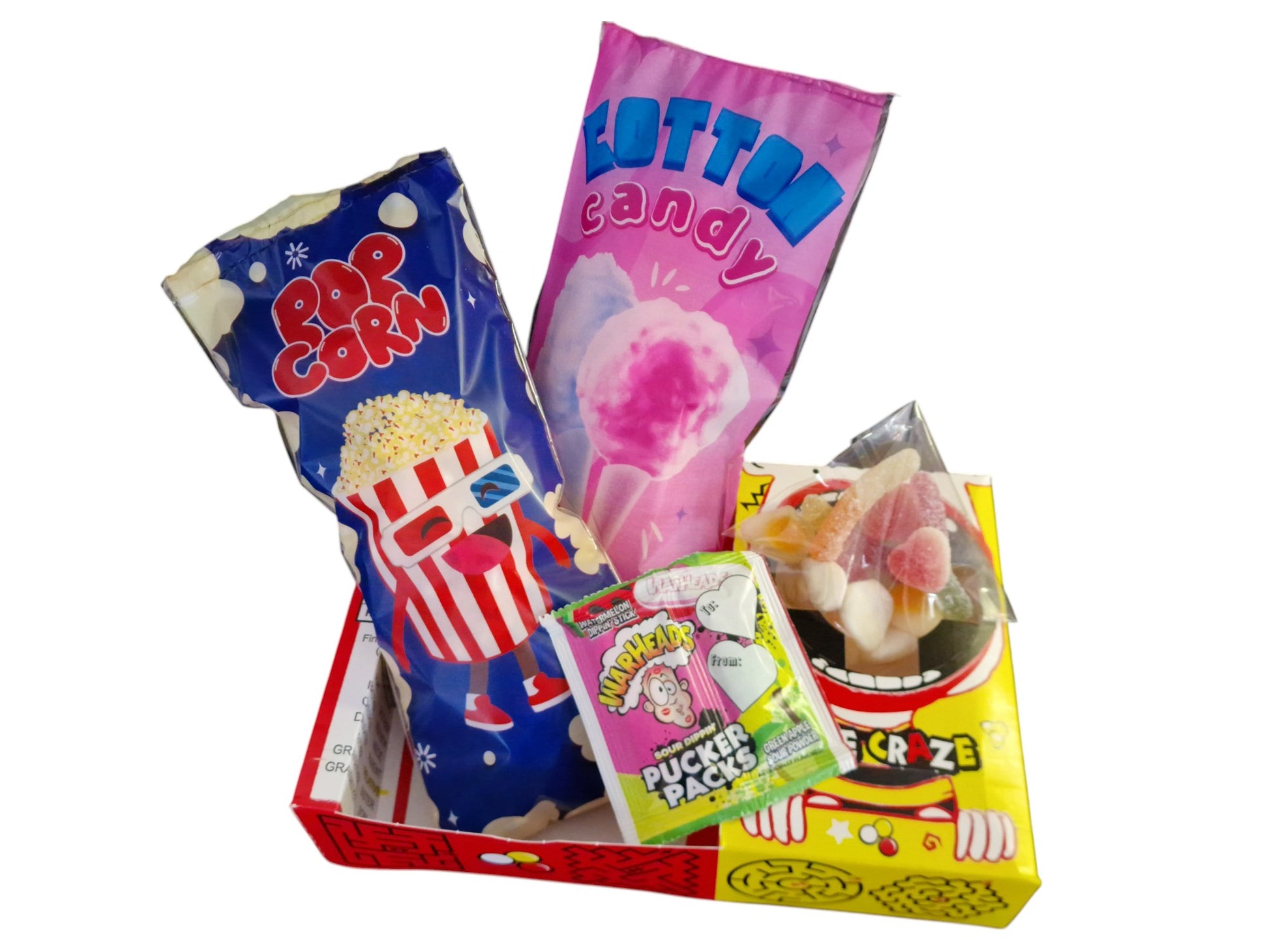 Assorted candy packages including Popcorn, Cotton Candy, and other treats in colorful packaging.