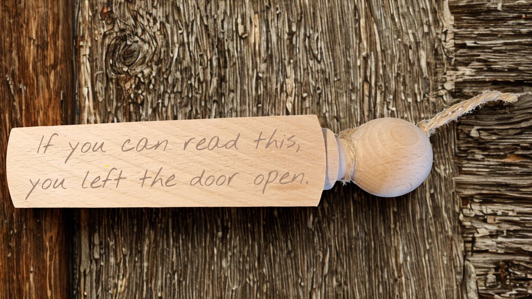 Wooden peg with a message on a wooden background