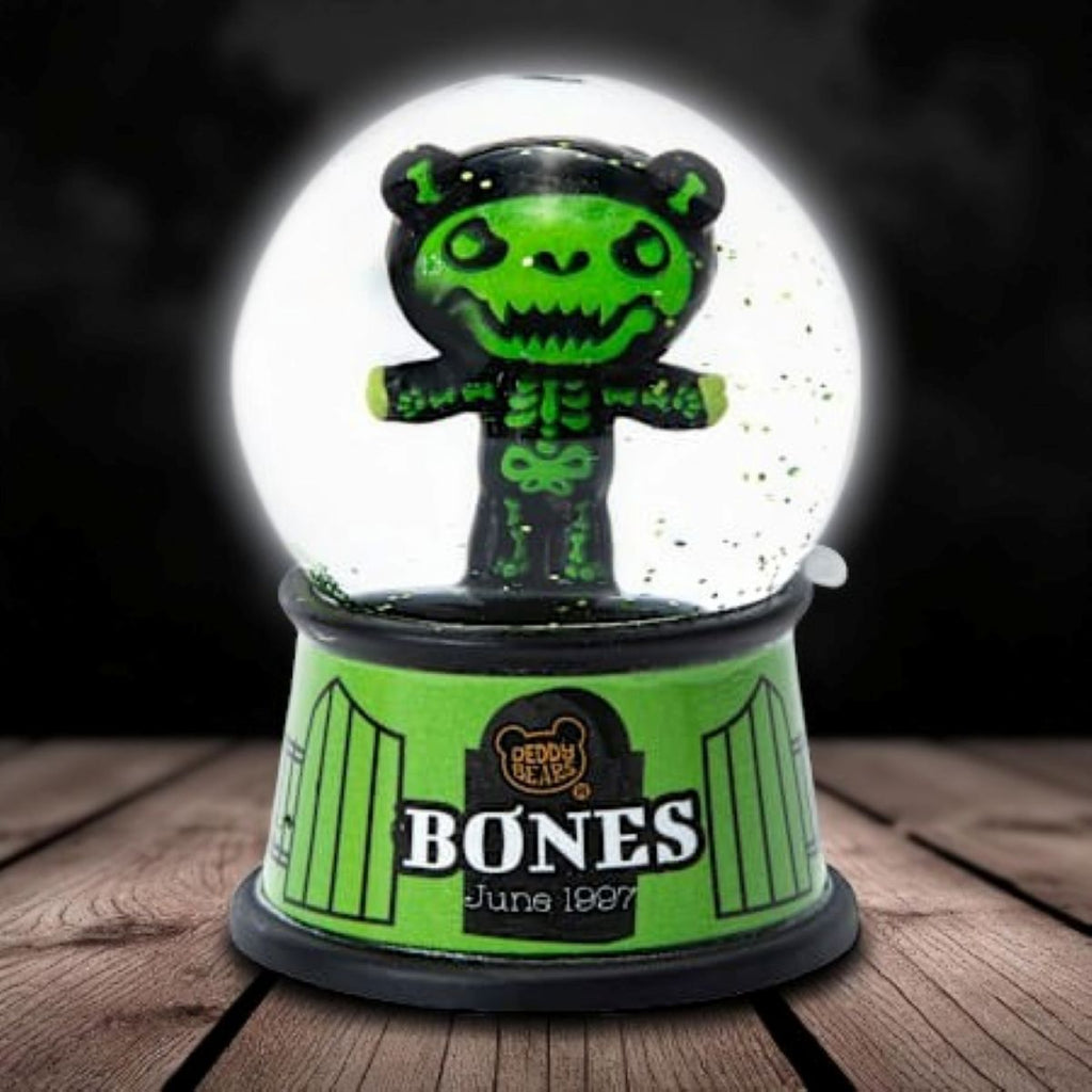 Deddy Bears Bones Mini Snow Globe with green skeleton bear inside, green and black base, collectible boxed figurine.