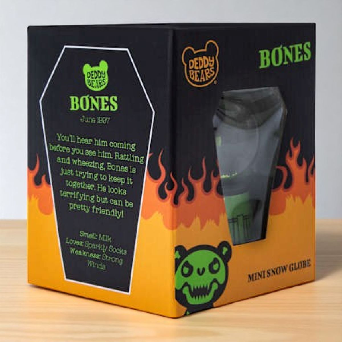 Deddy Bears Bones Mini Snow Globe with green skeleton bear inside, green and black base, collectible boxed figurine.