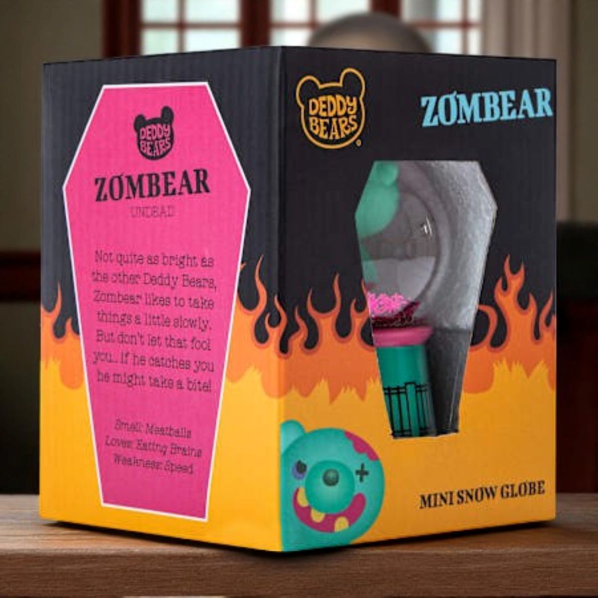 Deddy Bears Zombiebear Mini Snow Globe with green zombie bear inside, pink and teal base, collectible boxed figurine.