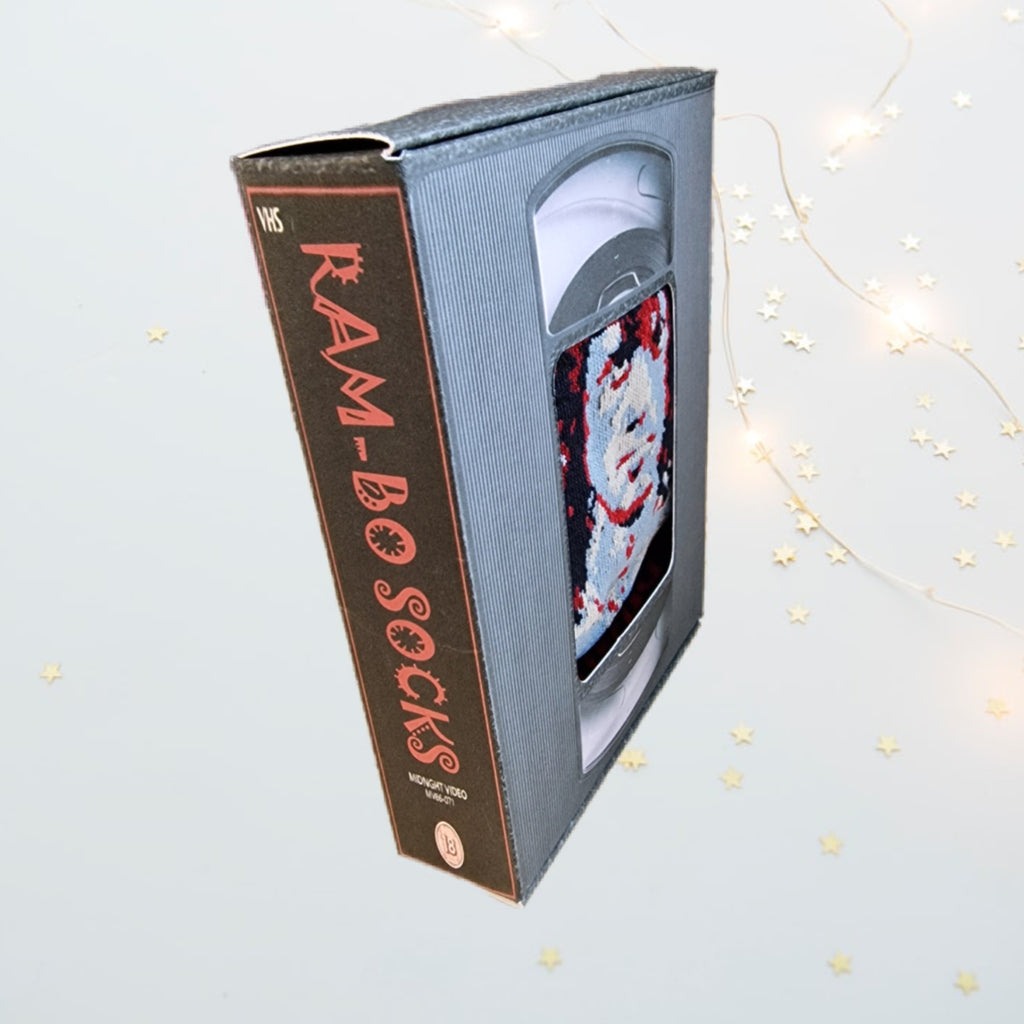VHS tape with 'Ram-Bo Socks' packaging on a light gray background