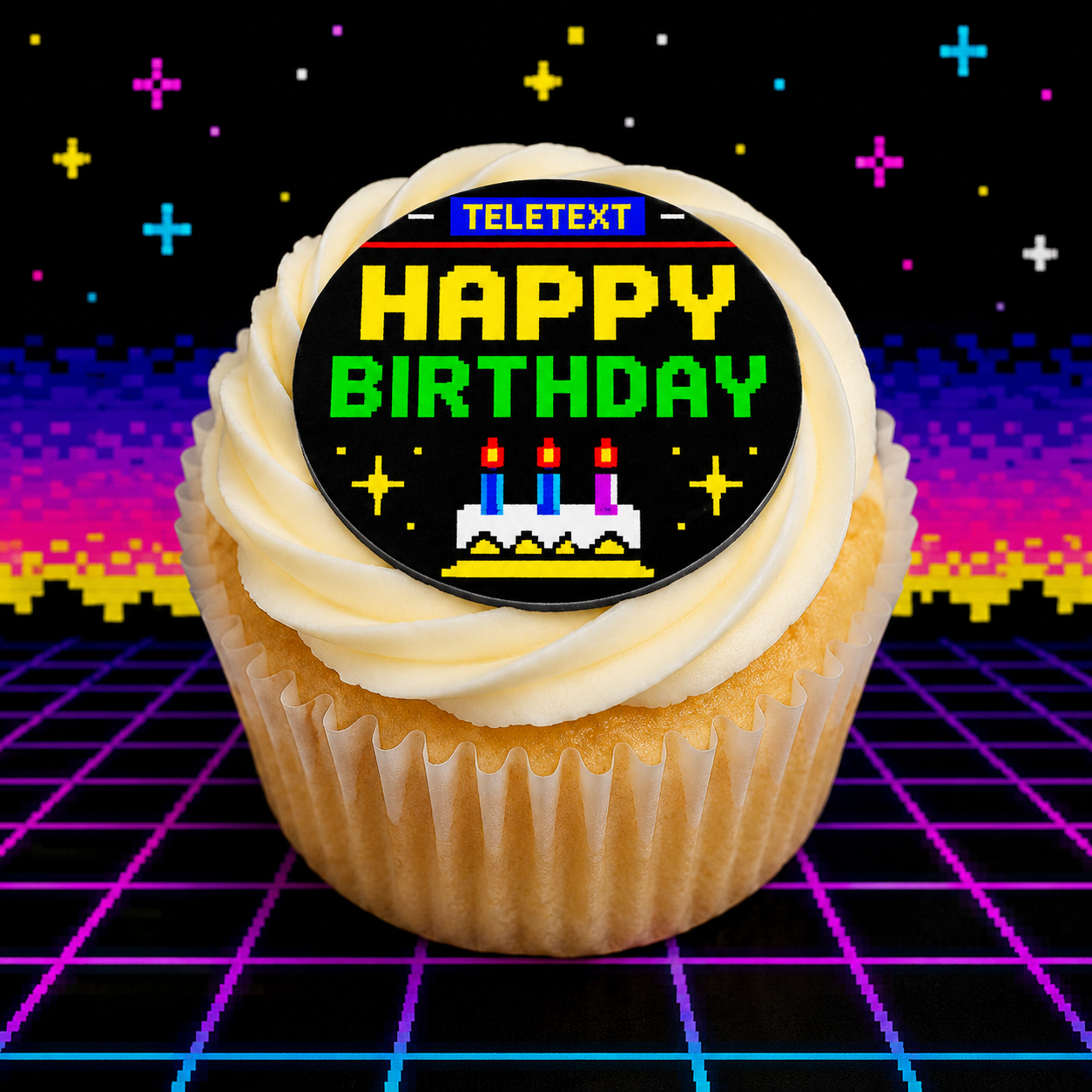 Cupcake with a retro 'Happy Birthday' teletext topper on a pixelated background
