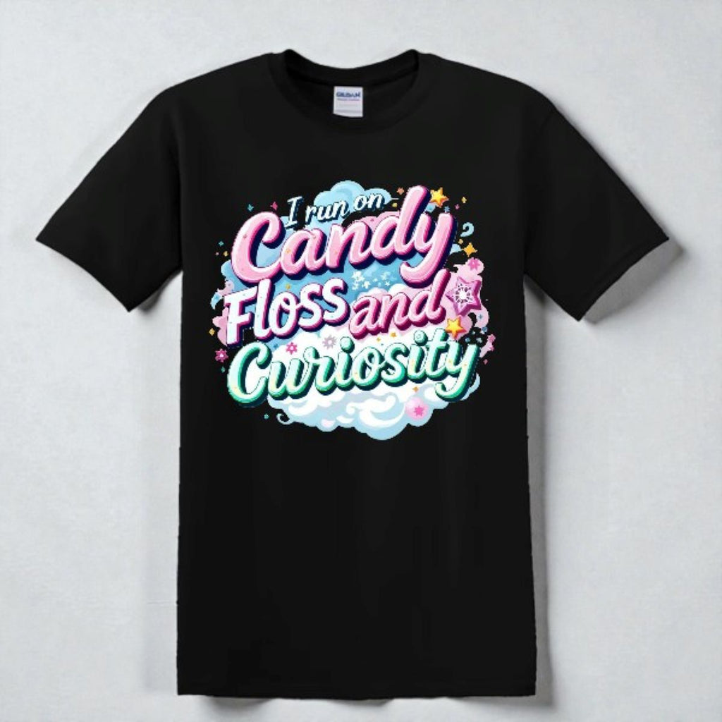 Black t-shirt with colorful text design on a light gray background