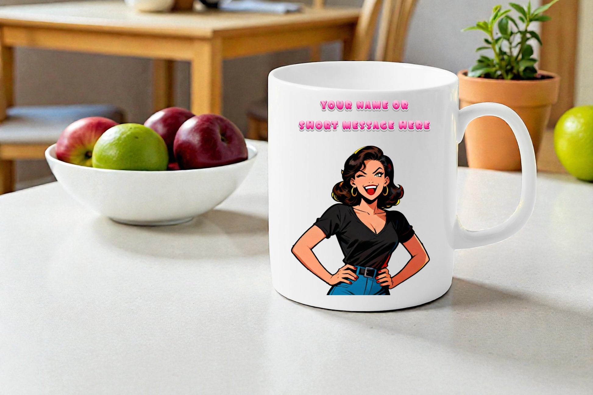 White mug with a cartoon character on a kitchen counter with apples and a plant in the background