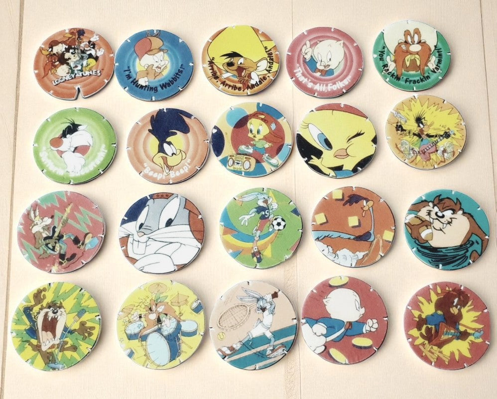Collection of cartoon character buttons on a beige background