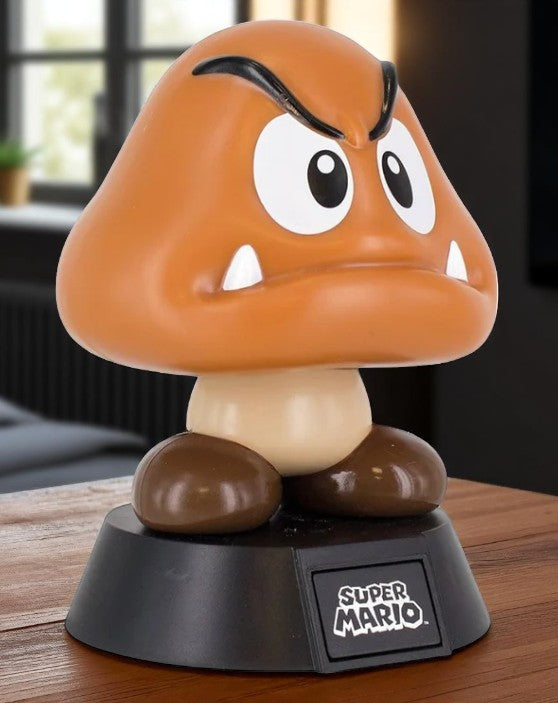 Paladone Icons Super Mario Goomba Light-Up Figure #002, 4-inch official Nintendo collectible, brown Goomba on black base, boxed.