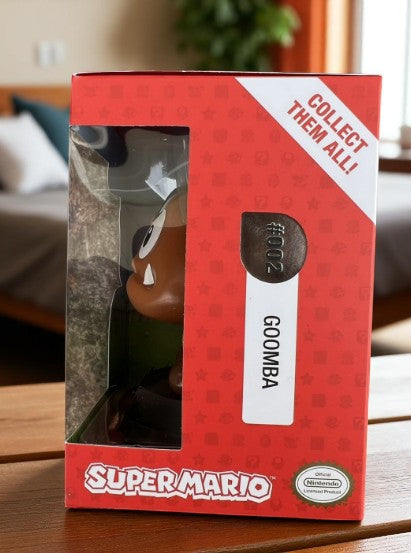Paladone Icons Super Mario Goomba Light-Up Figure #002, 4-inch official Nintendo collectible, brown Goomba on black base, boxed.