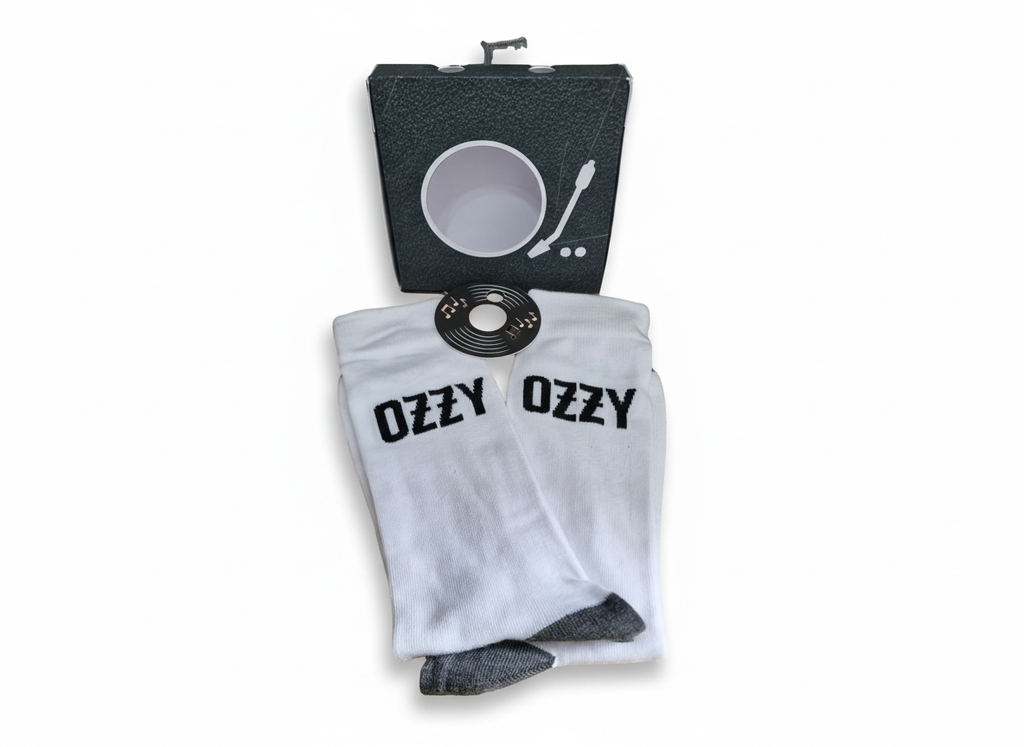 White t-shirt with 'Ozzy' text, black pouch, and CD on a white background