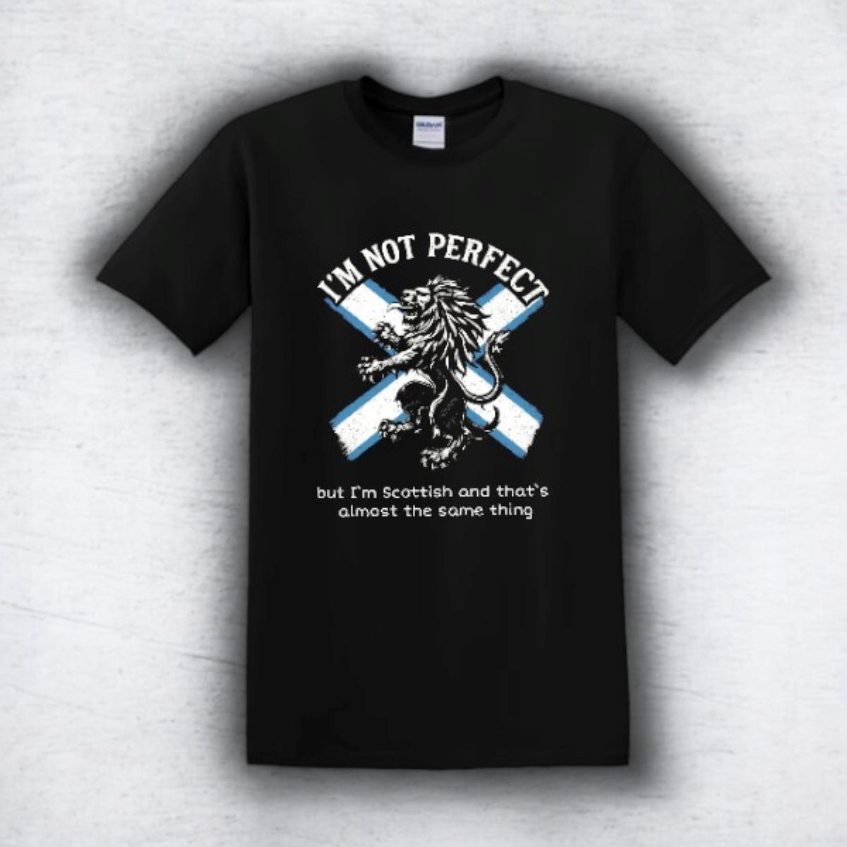 Black t-shirt with Scottish lion design and text on a white background