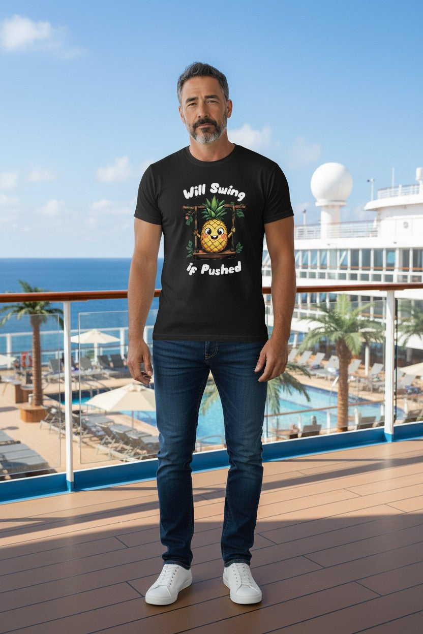Man wearing a black t-shirt with a graphic design on a cruise ship deck.