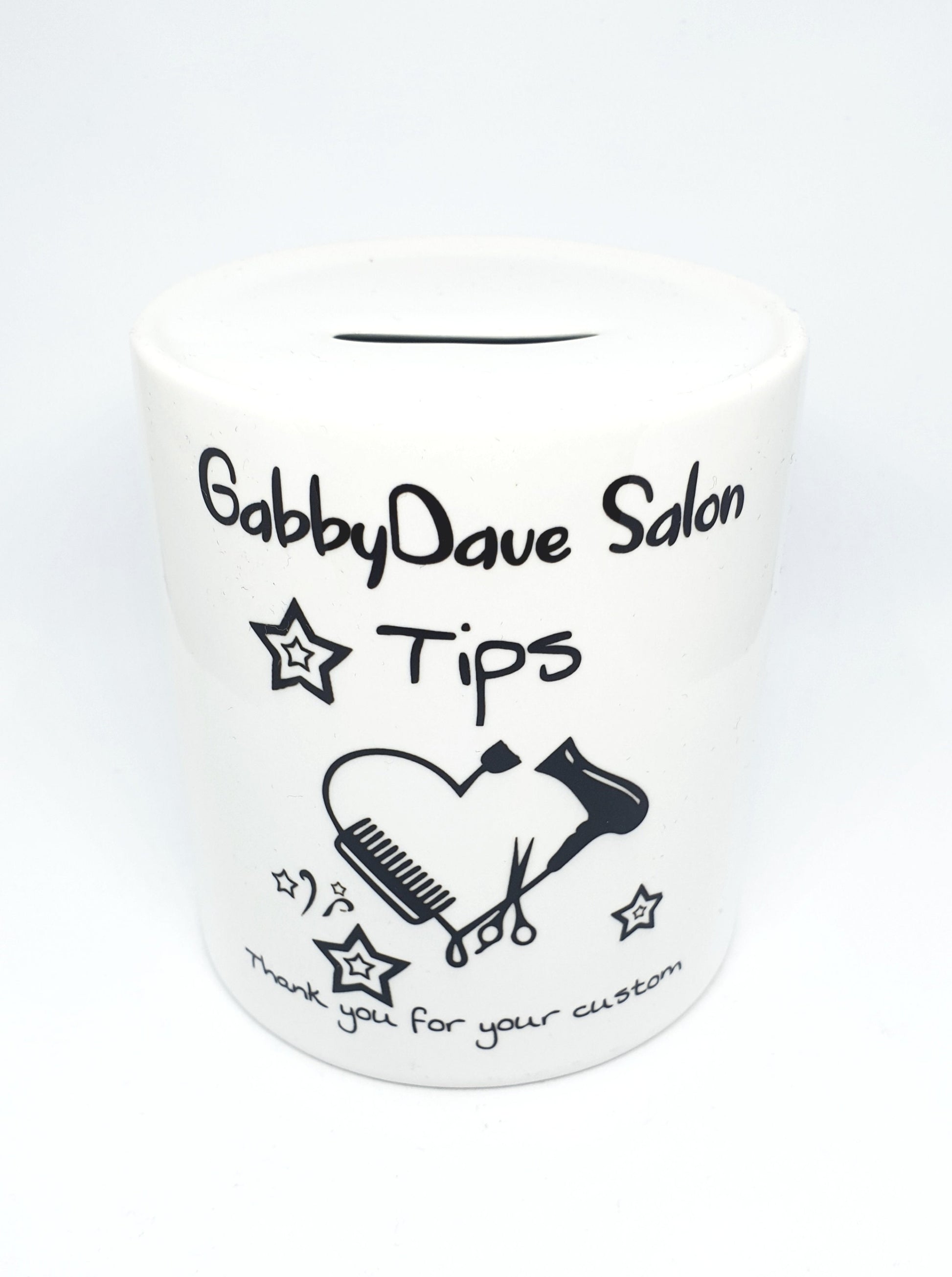 Premium glossy ceramic money box with personalised name, featuring a white rubber plug underneath and a coin slot on top.